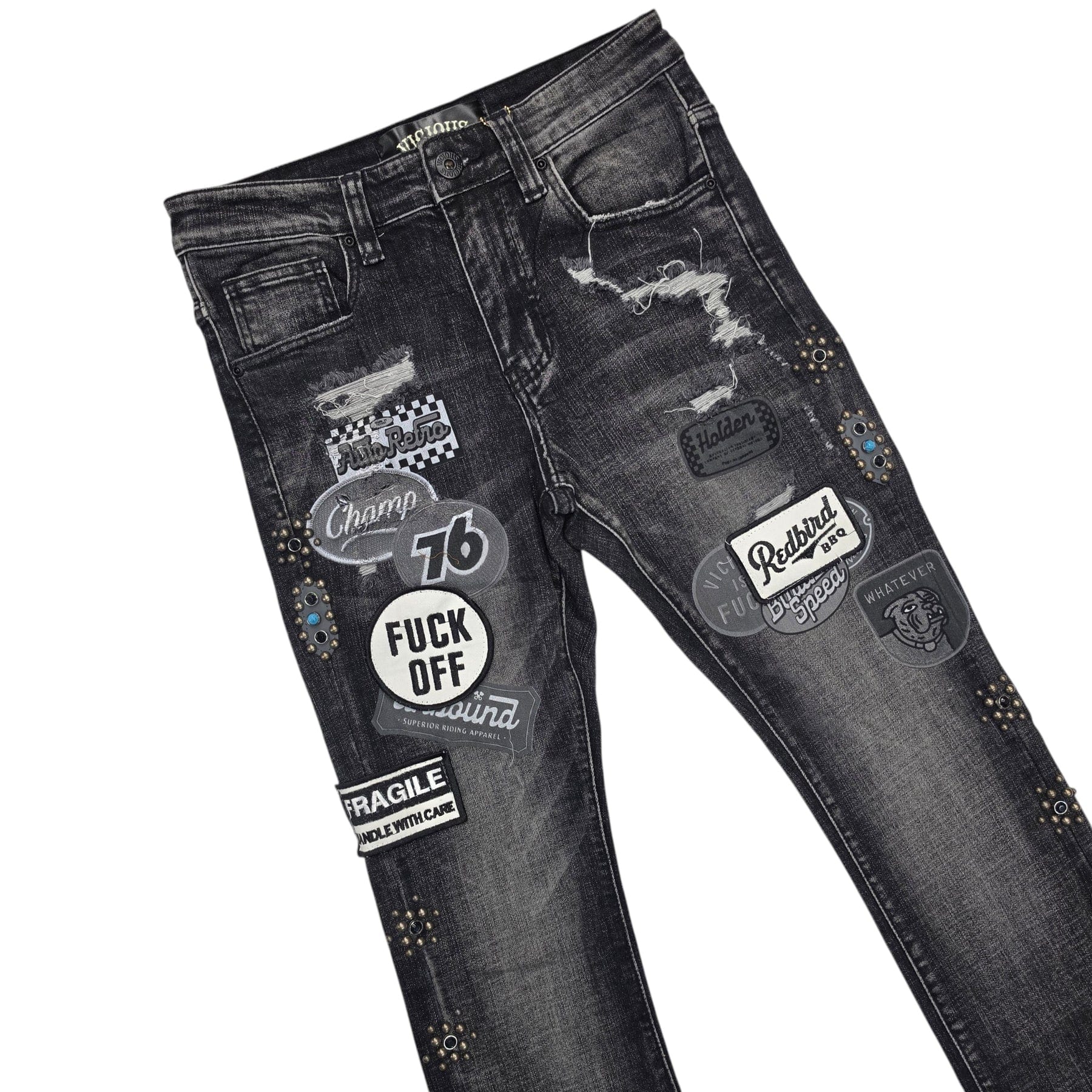 Vicious denim flare stacked jeans with patches and stone embellishments, featuring a fitted waist and flared leg design.