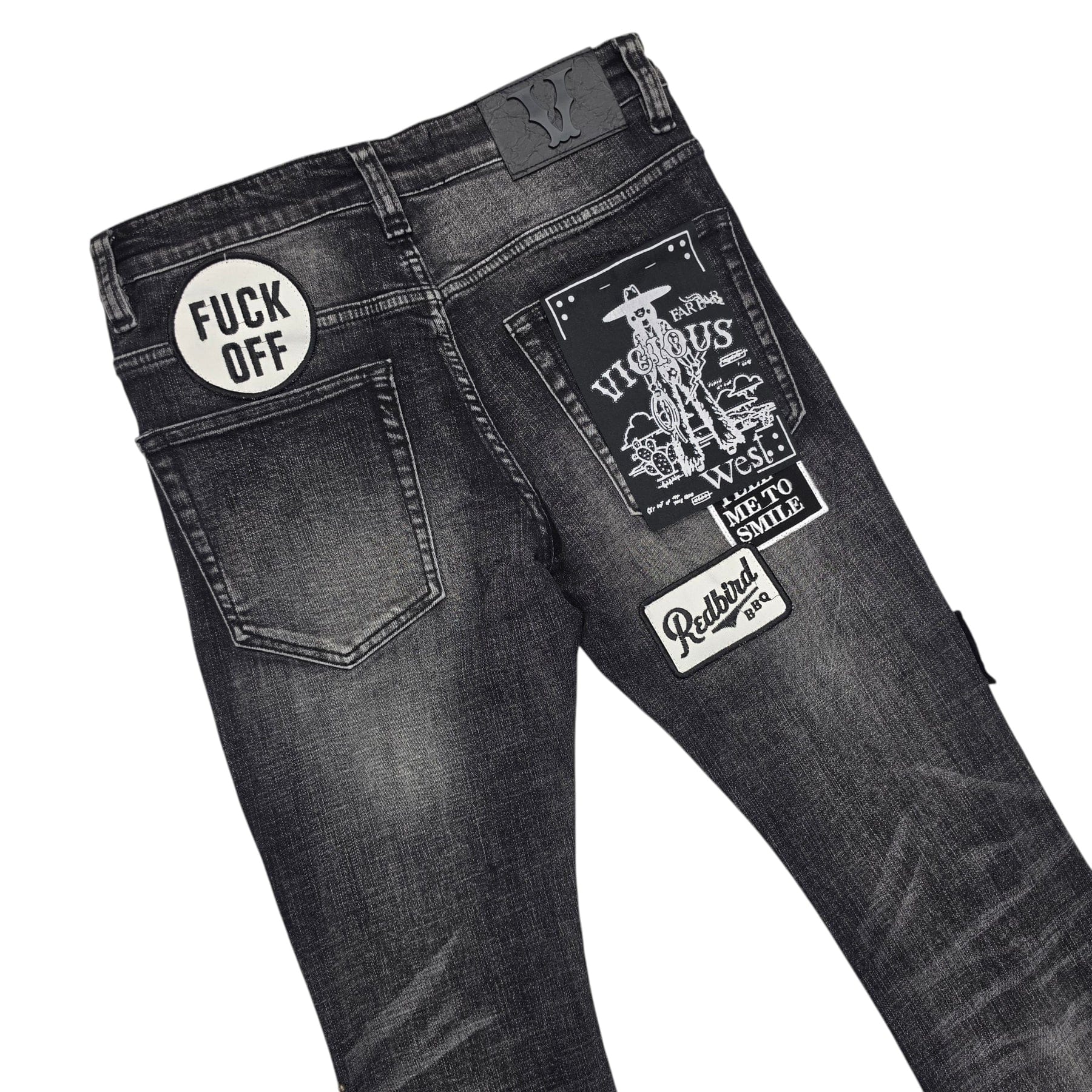Vicious Flare Stacked Jeans with patches and stones, denim pants featuring a distressed, stylish design with decorative embellishments.