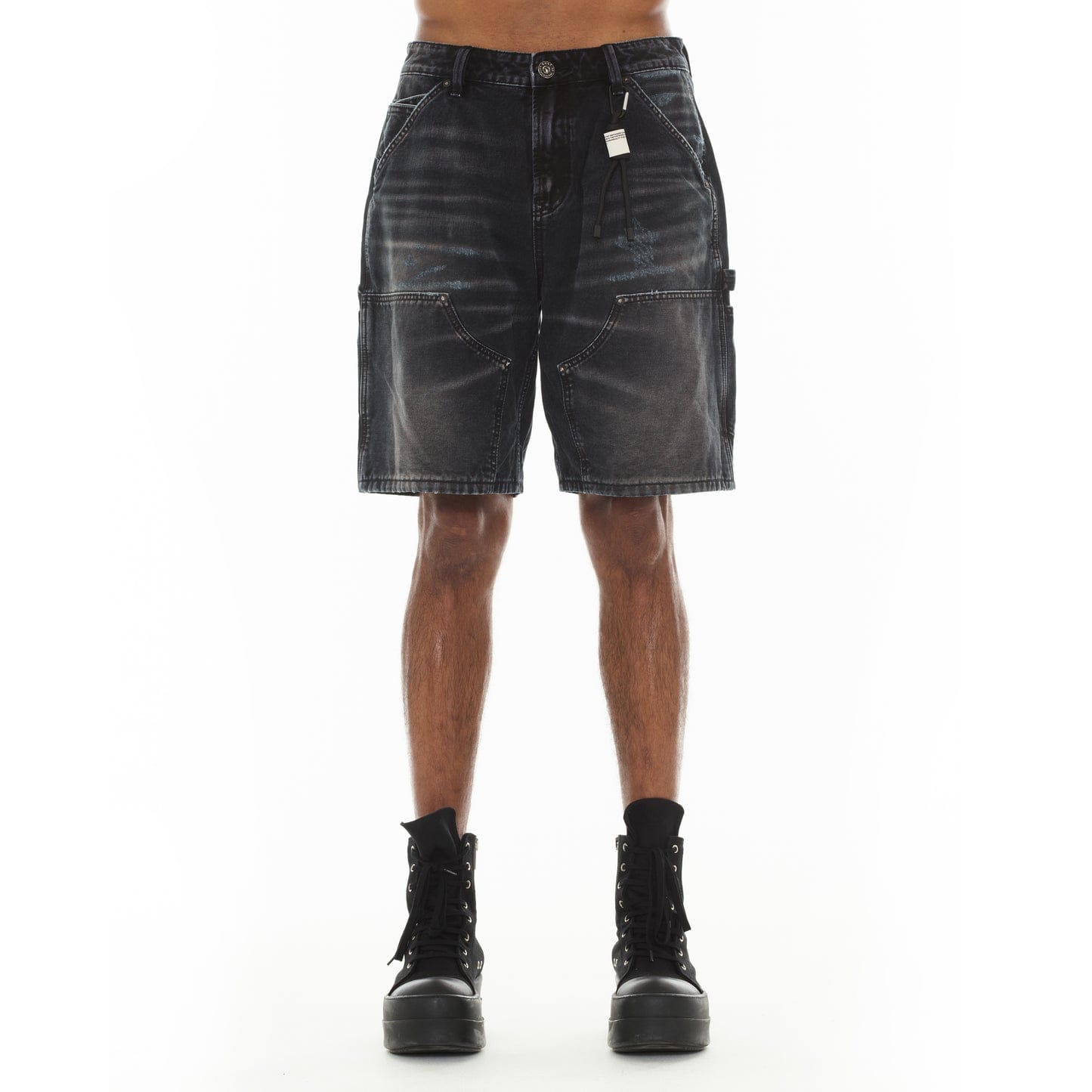 Cult of Individuality black canvas carpenter shorts featuring denim style with multiple pockets and a rugged grunge look.