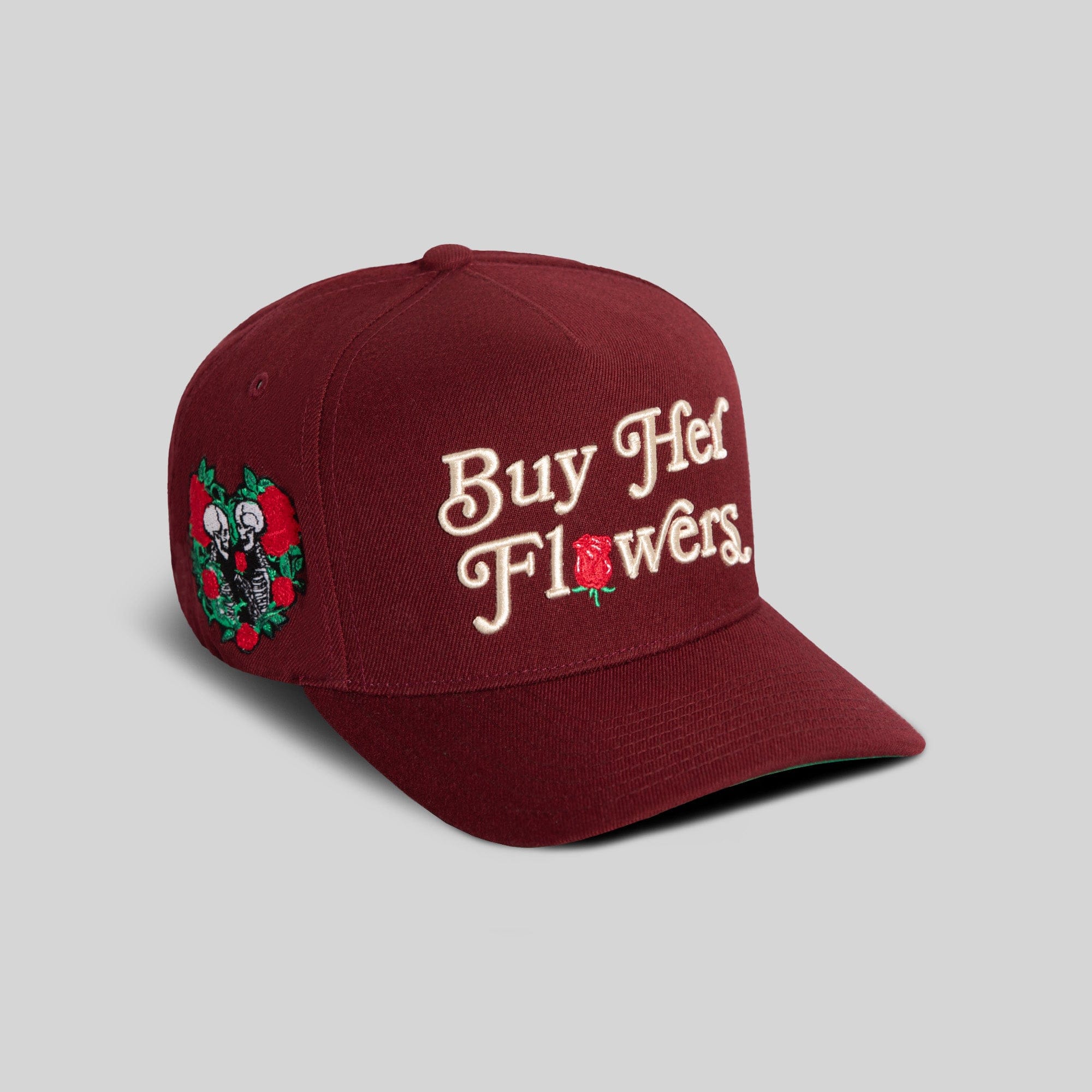 Field Grade Buy Her Flowers Bordeaux wool trucker hat with curved brim and adjustable strap, stylish and comfortable headwear.
