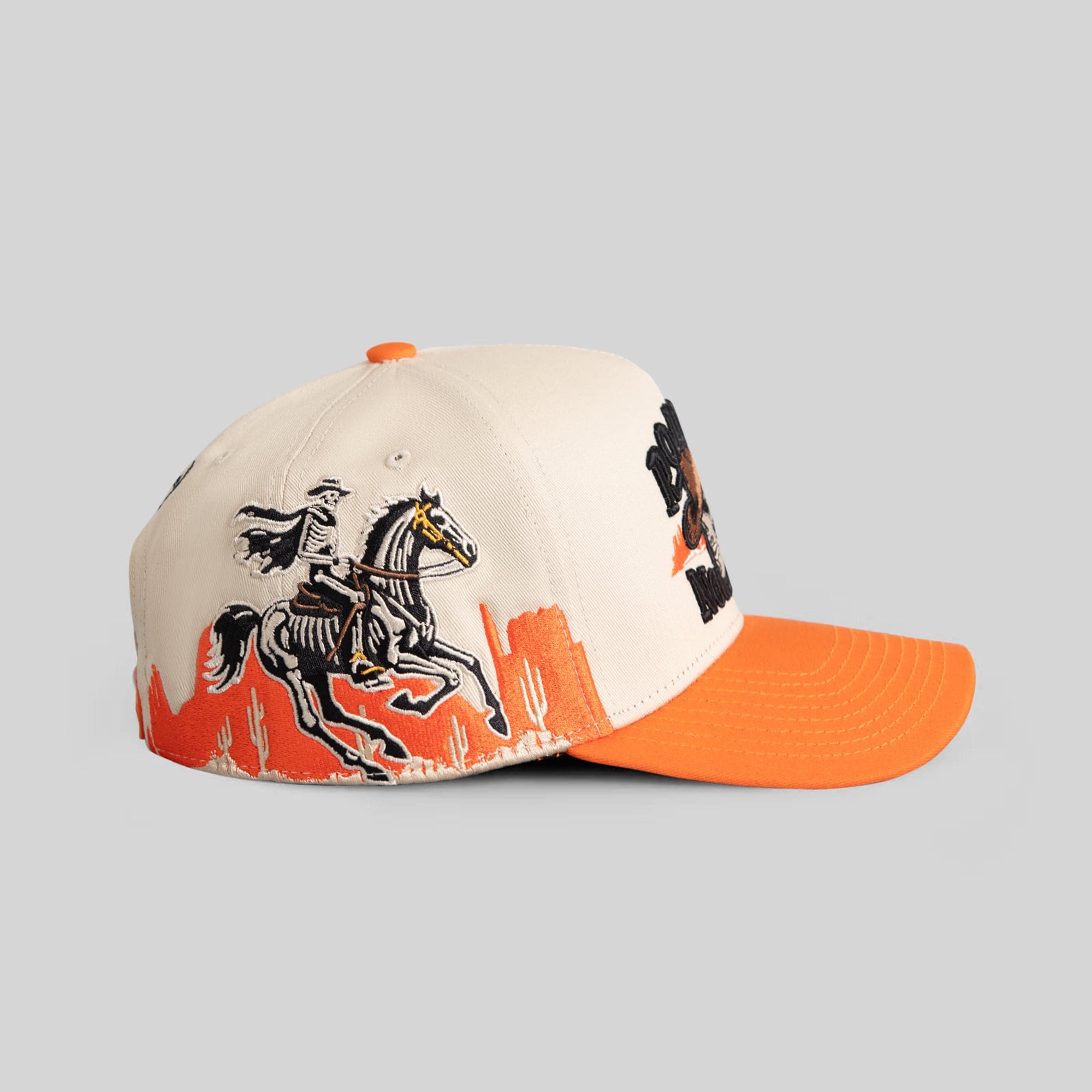 Field Grade Road To Nowhere Sand Orange Twill Trucker Hat with curved brim and adjustable snapback closure.