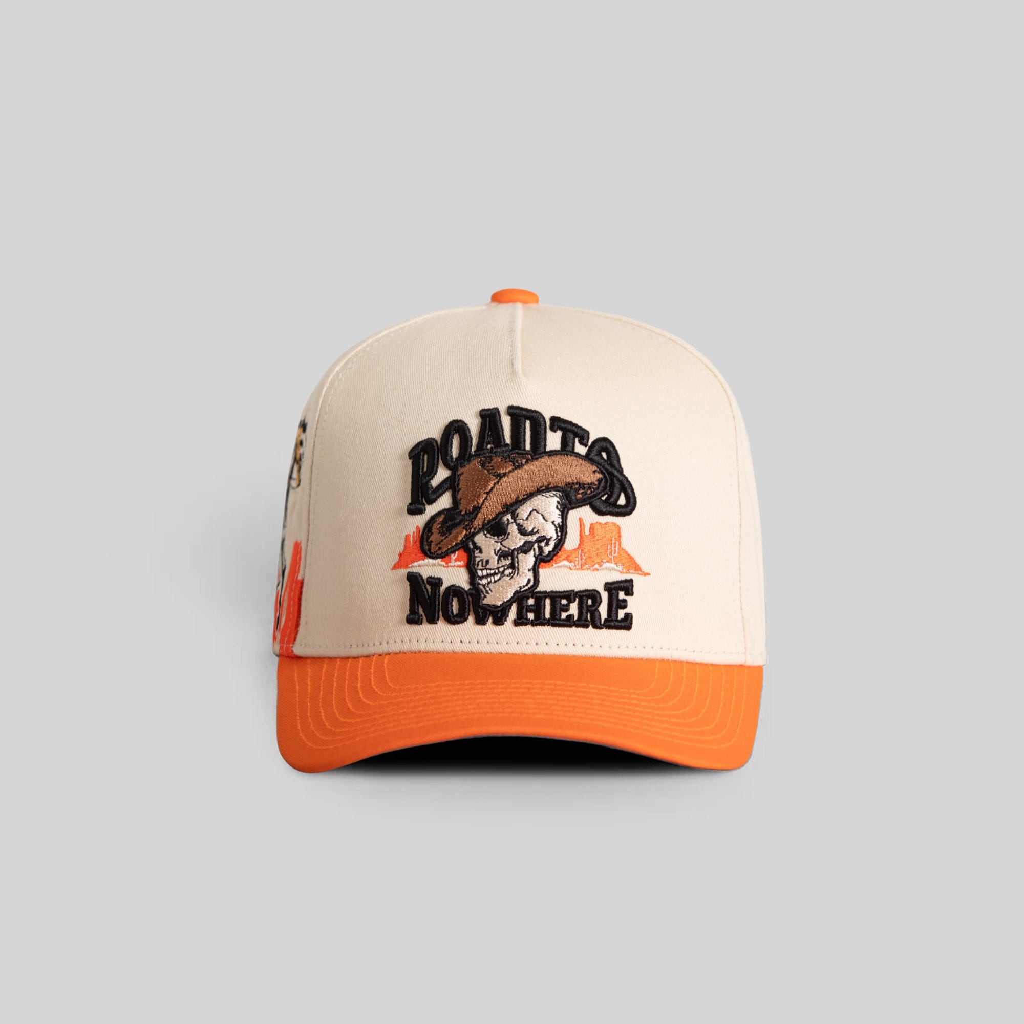 Field Grade Road To Nowhere Sand Orange Twill Trucker Hat with curved brim and adjustable strap, casual outdoor style.