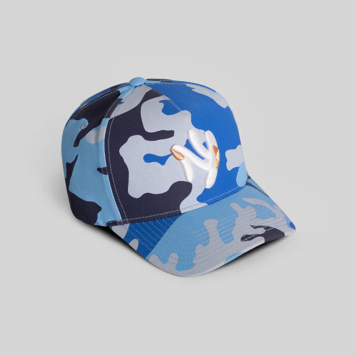 Field Grade Yankee Camo Ice Blue Hat featuring a camouflage pattern and adjustable strap for a stylish, comfortable fit.