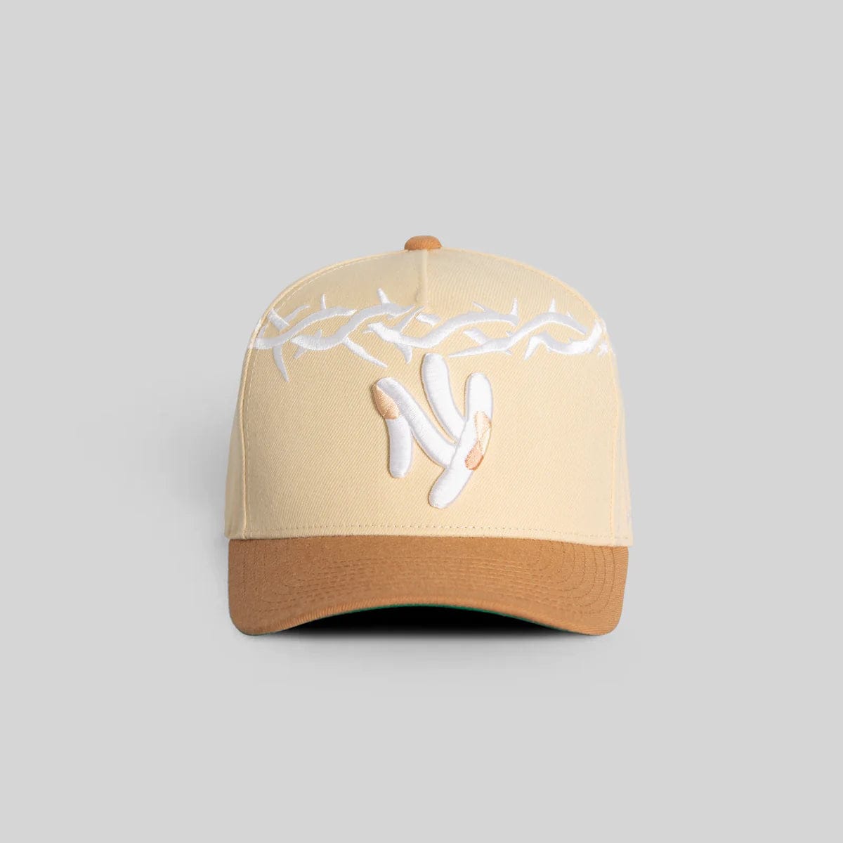 Field Grade Yankee Thorn Crown beige hat with wide brim and decorative band, stylish and lightweight for outdoor wear.