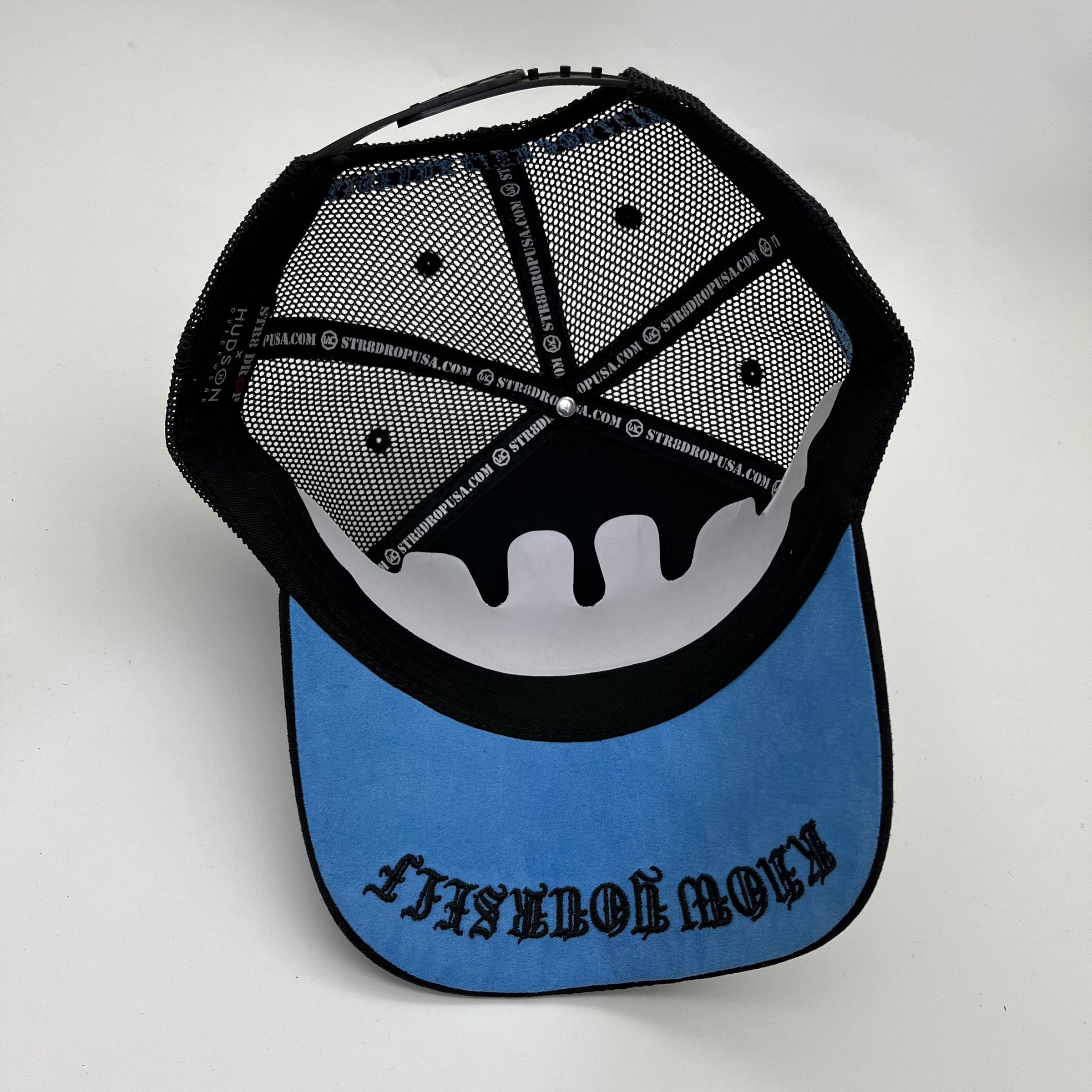 Hudson Outerwear V1 Diamond Suede Trucker Hat in black and university blue, featuring a classic trucker cap design.