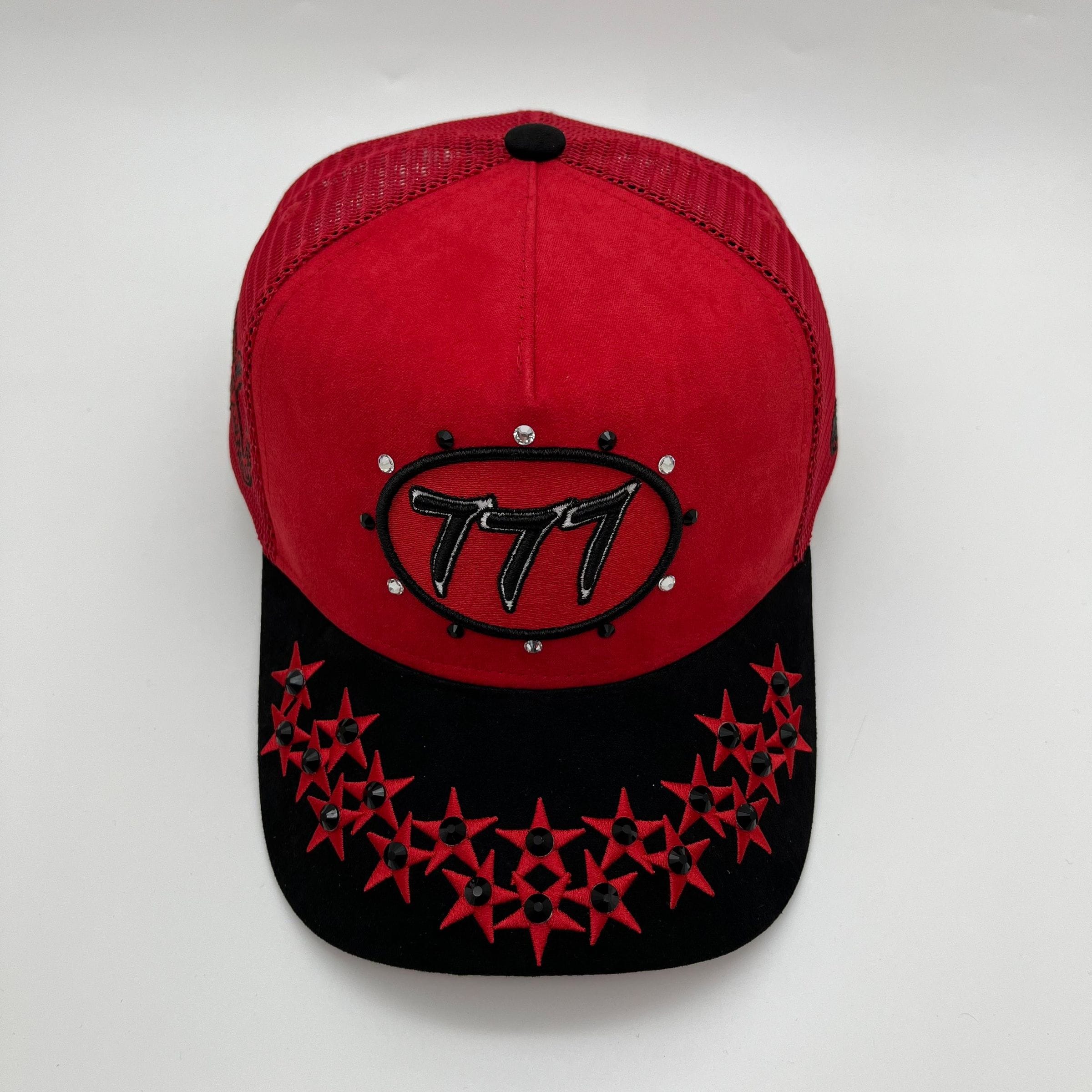 Red Hudson Outerwear V1 Diamond Suede Trucker Hat with structured front and adjustable snapback closure.