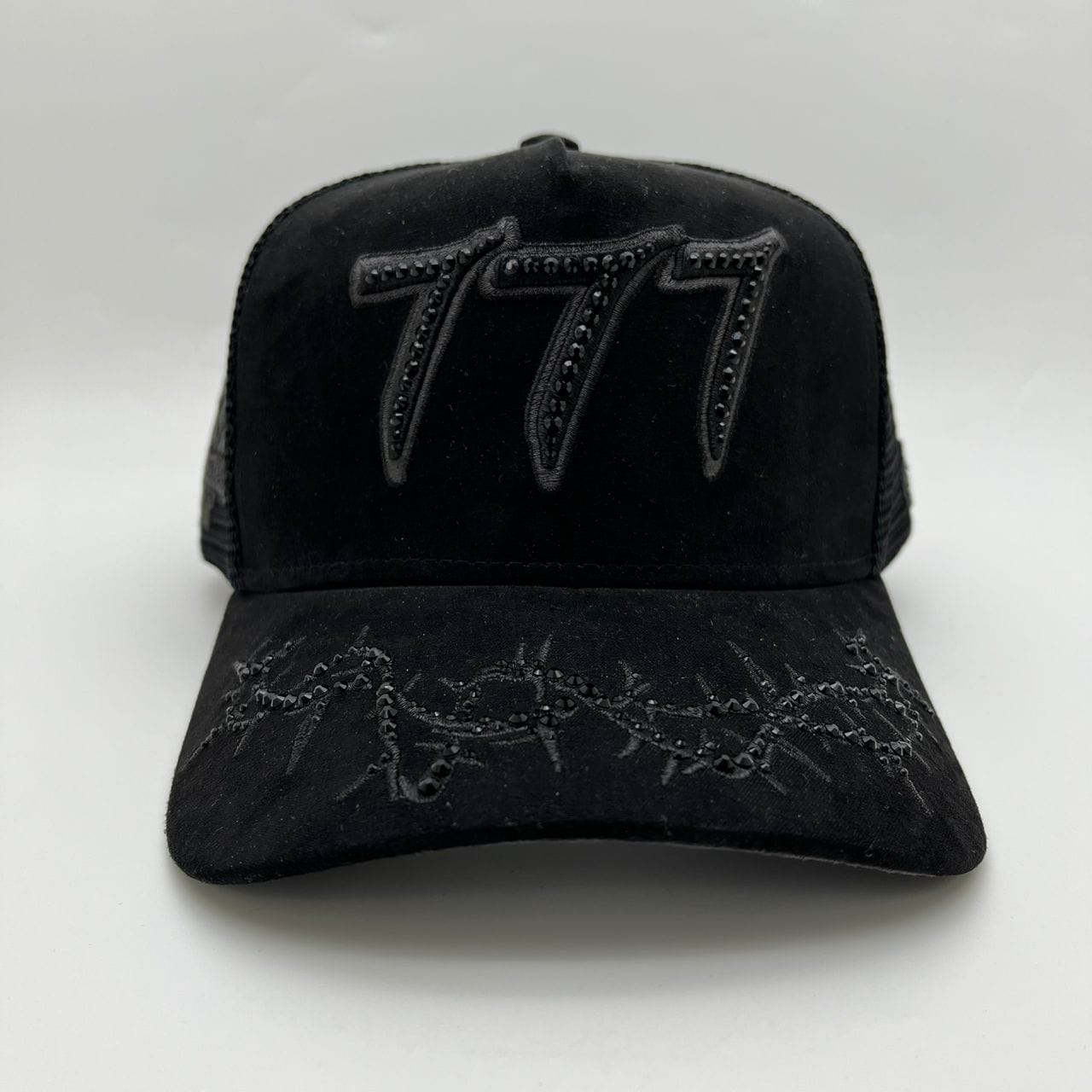 Hudson Outerwear V2 Diamond Suede Trucker Hat in black with mesh back and curved brim, stylish and comfortable hat for casual wear.