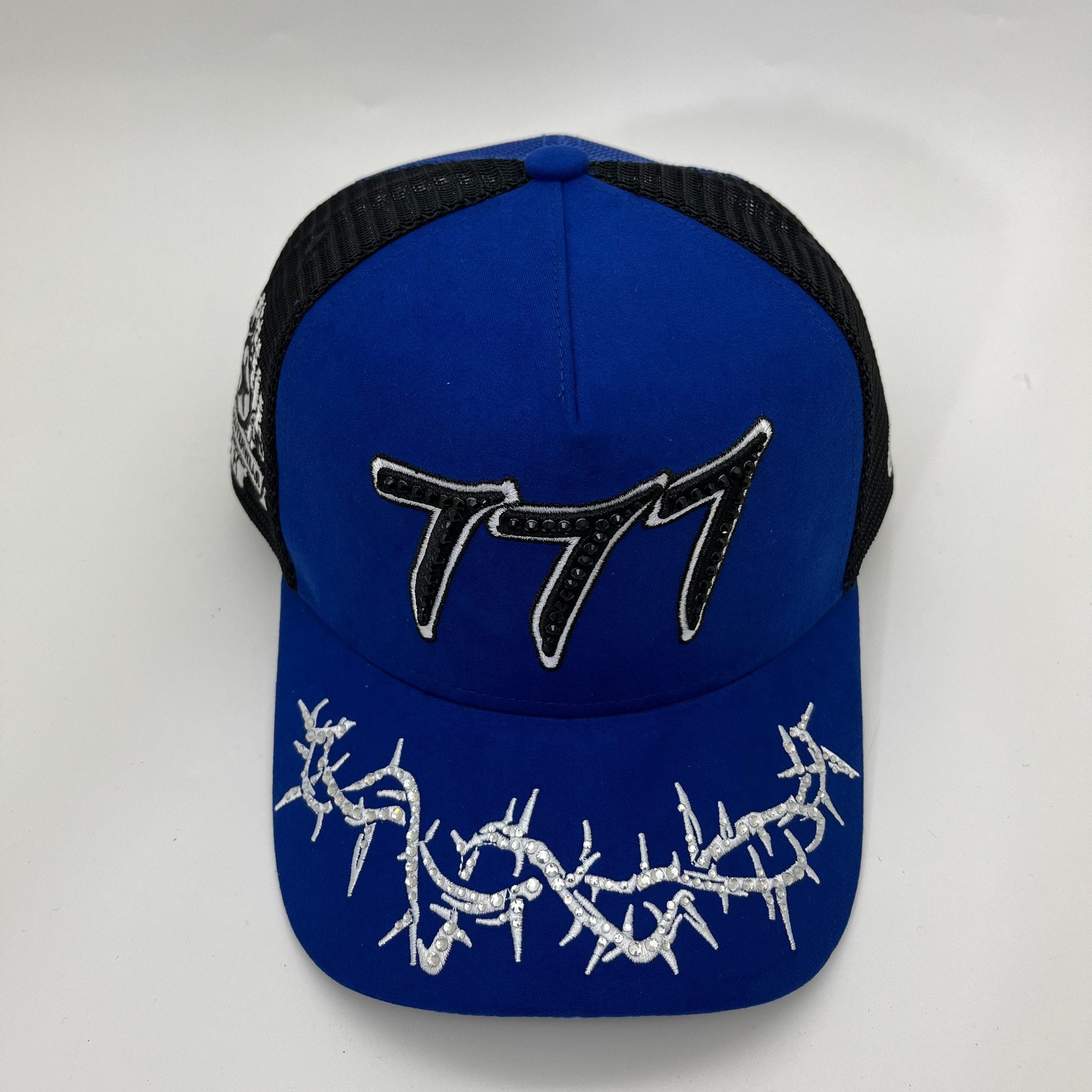 Blue Hudson Outerwear V2 Diamond Suede Trucker Hat with mesh back and adjustable snap closure.