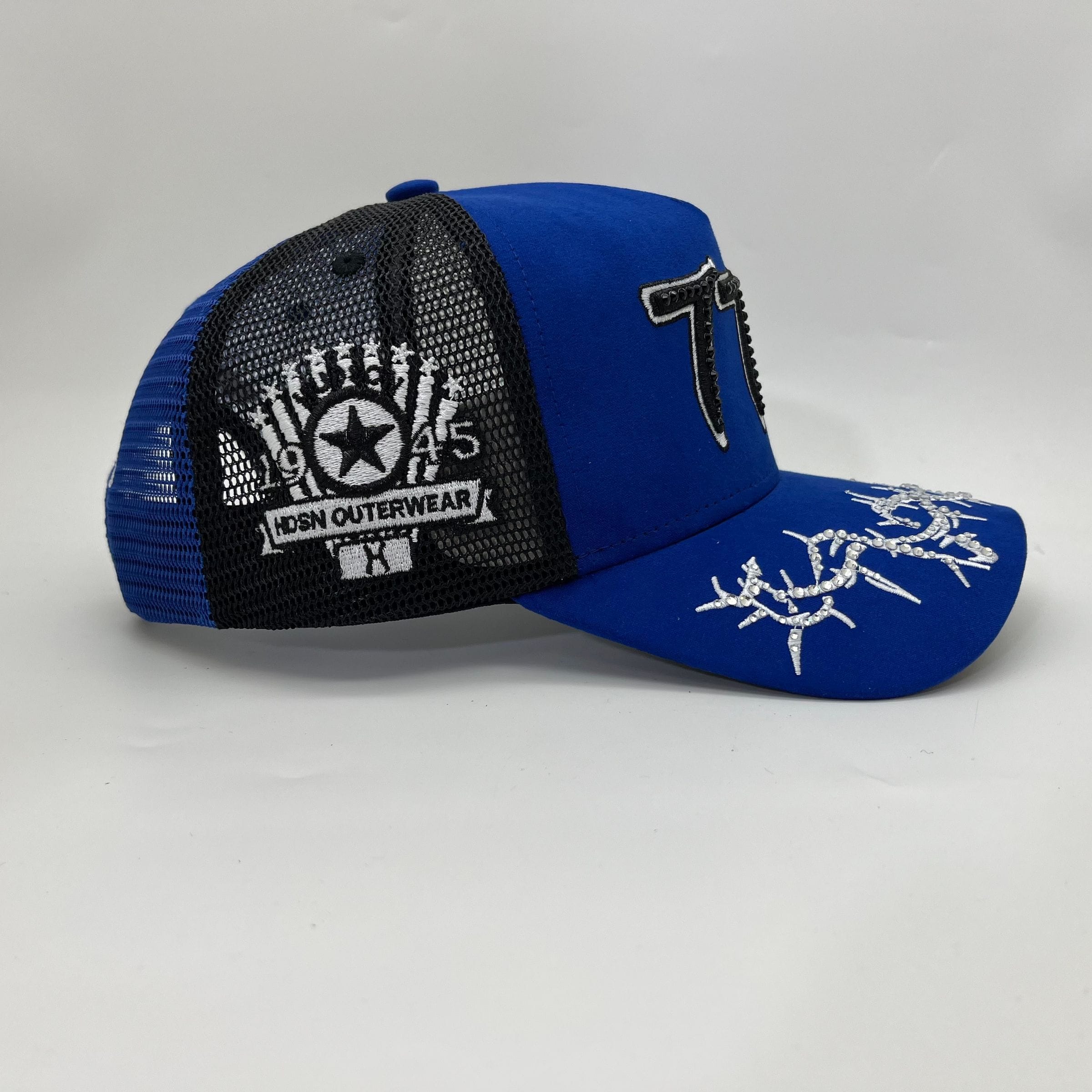 Hudson Outerwear V2 Diamond Suede Trucker Hat in blue, featuring a classic curved brim and adjustable snapback closure.