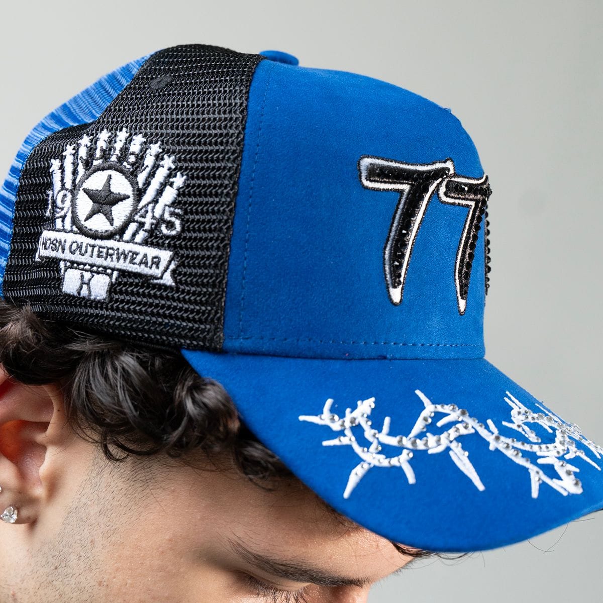 Hudson Outerwear V2 Diamond Suede Trucker Hat in blue with mesh back and structured front panel.