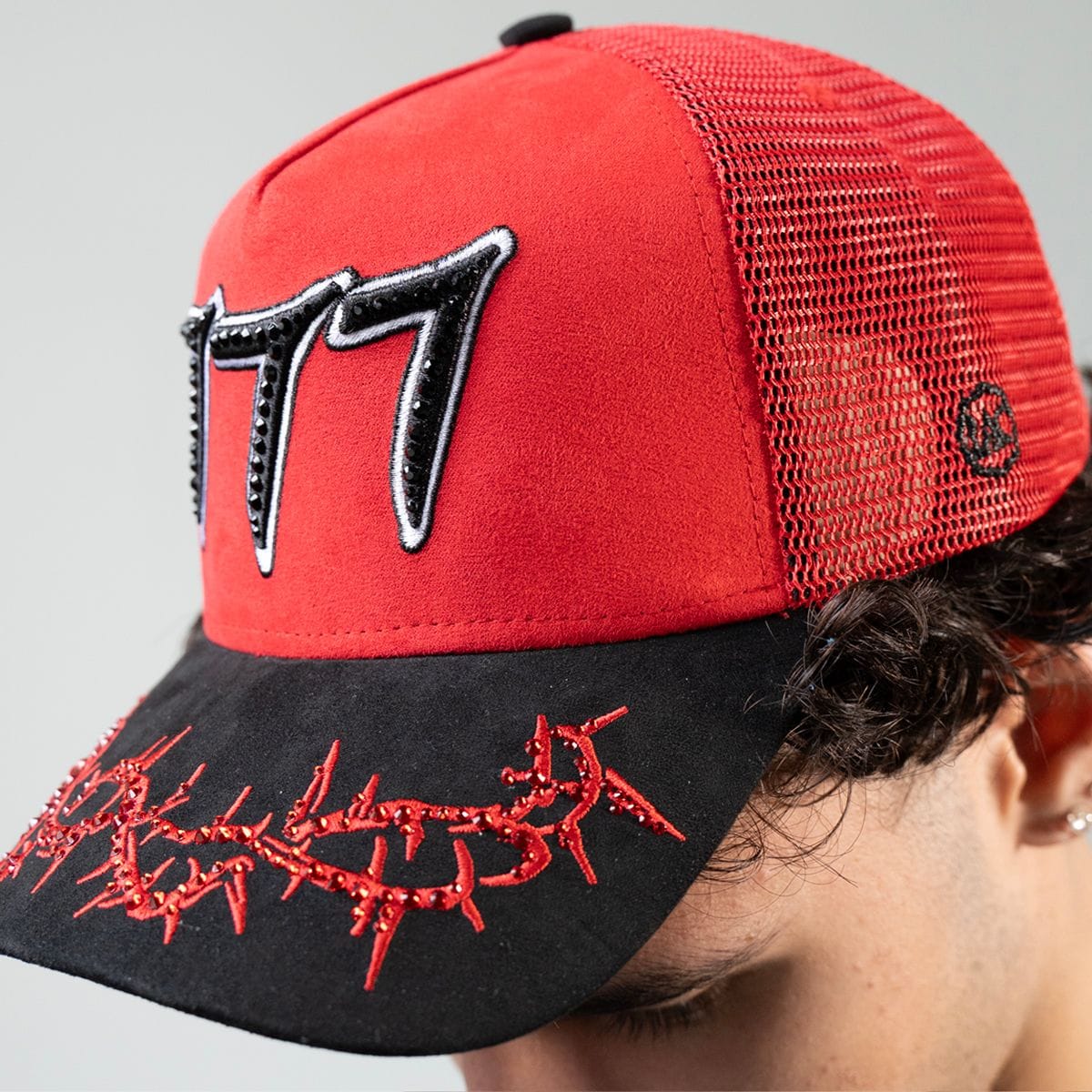 Hudson Outerwear V2 Diamond Suede Trucker Hat with mesh back and adjustable strap, featuring a diamond pattern design.