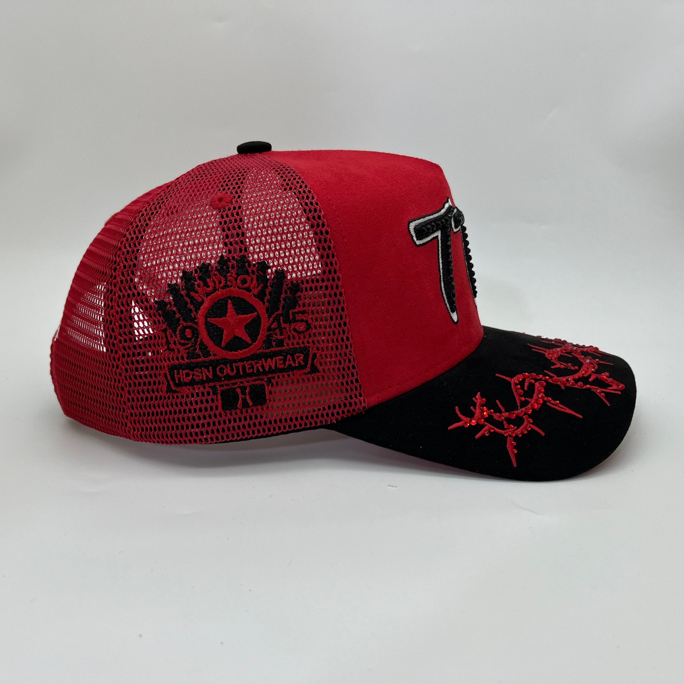 Hudson Outerwear V2 Diamond Suede Trucker Hat featuring a classic mesh back and diamond-patterned suede front in a casual style.