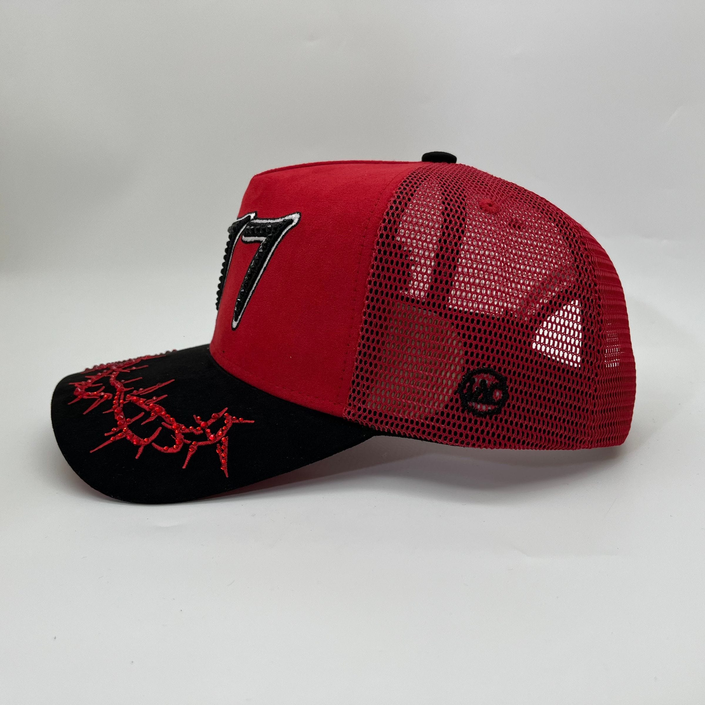 Hudson Outerwear V2 Diamond Suede Trucker Hat with curved brim and adjustable strap, featuring diamond-patterned suede material.