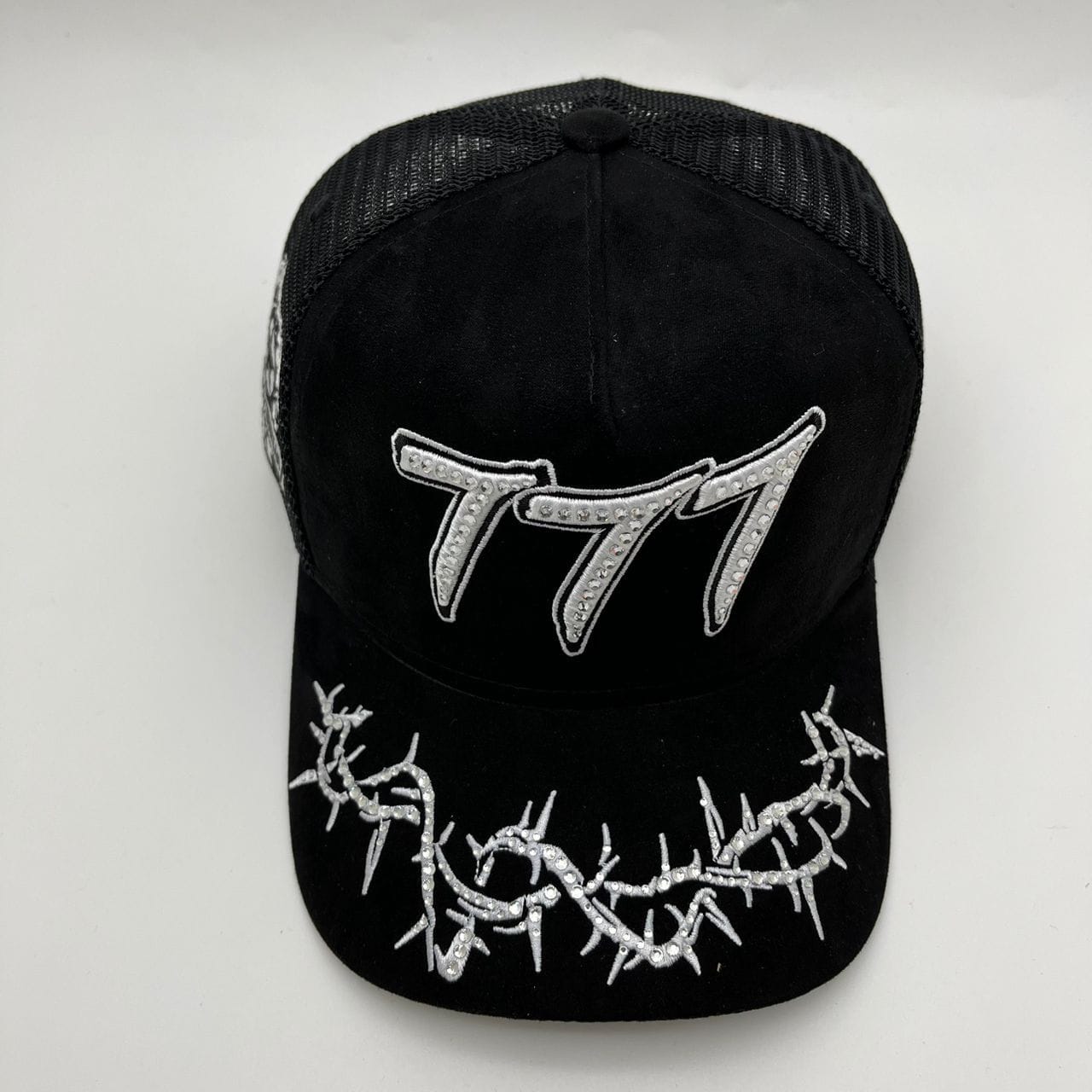 Hudson Outerwear V2 Diamond Suede Trucker Hat with curved brim and diamond-patterned suede fabric, stylish and casual headwear.