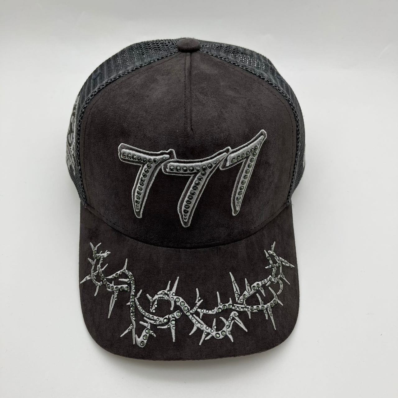 Hudson Outerwear V2 Diamond Suede Trucker Hat with curved brim and adjustable snapback in diamond suede fabric.