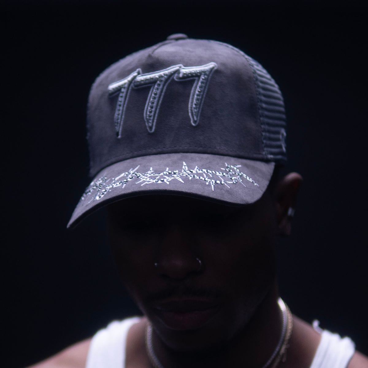 Hudson Outerwear V2 Diamond Suede Trucker Hat with curved brim and diamond-patterned suede fabric, casual outdoor style.