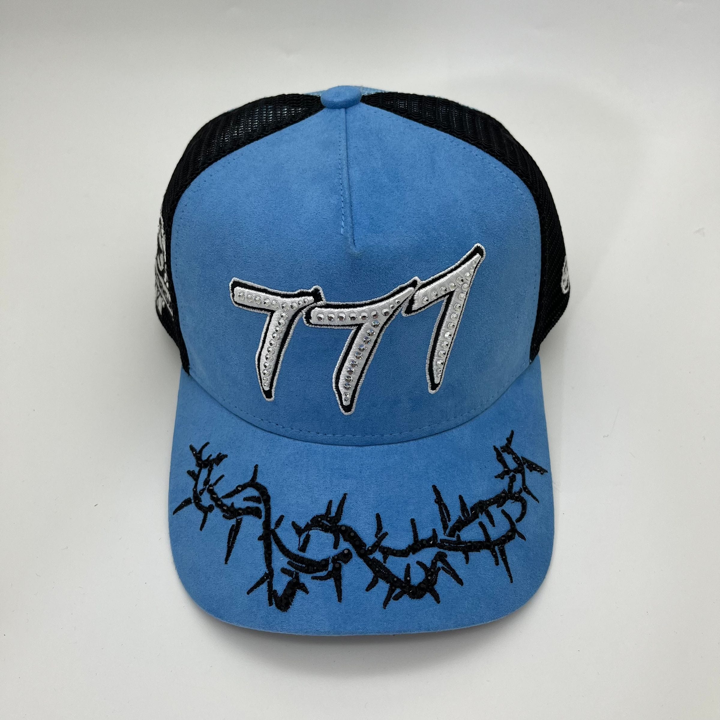 Hudson Outerwear V2 Diamond Suede Trucker Hat in University Blue, featuring a classic trucker style with suede texture and adjustable strap.