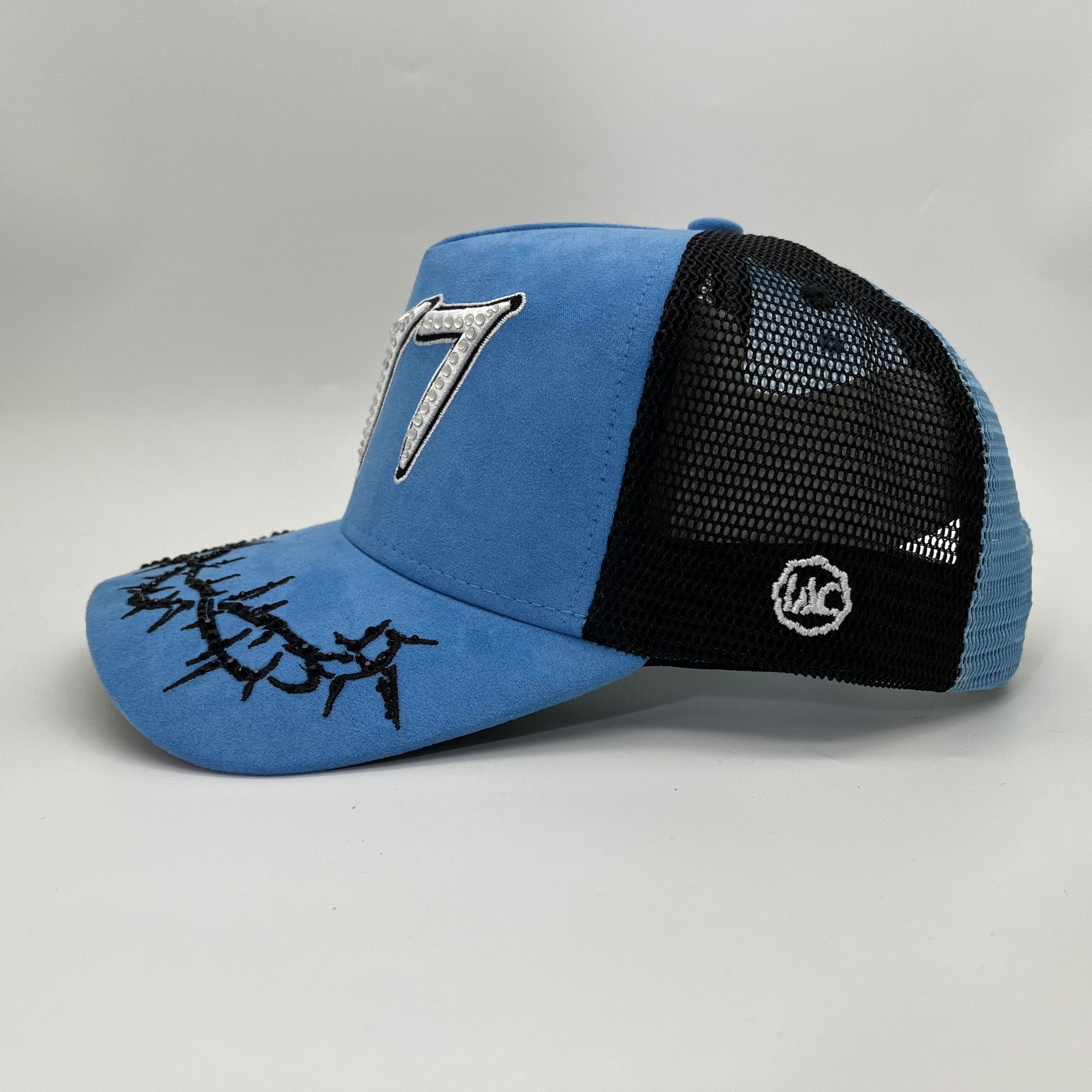 Hudson Outerwear V2 Diamond Suede Trucker Hat in university blue, featuring a classic curved brim and adjustable strap.