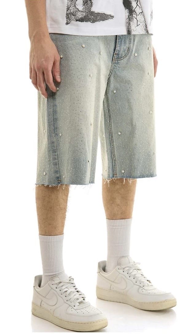 KDNK rhinestone embellished denim shorts with decorative stones and frayed hem, casual summer fashion for women.