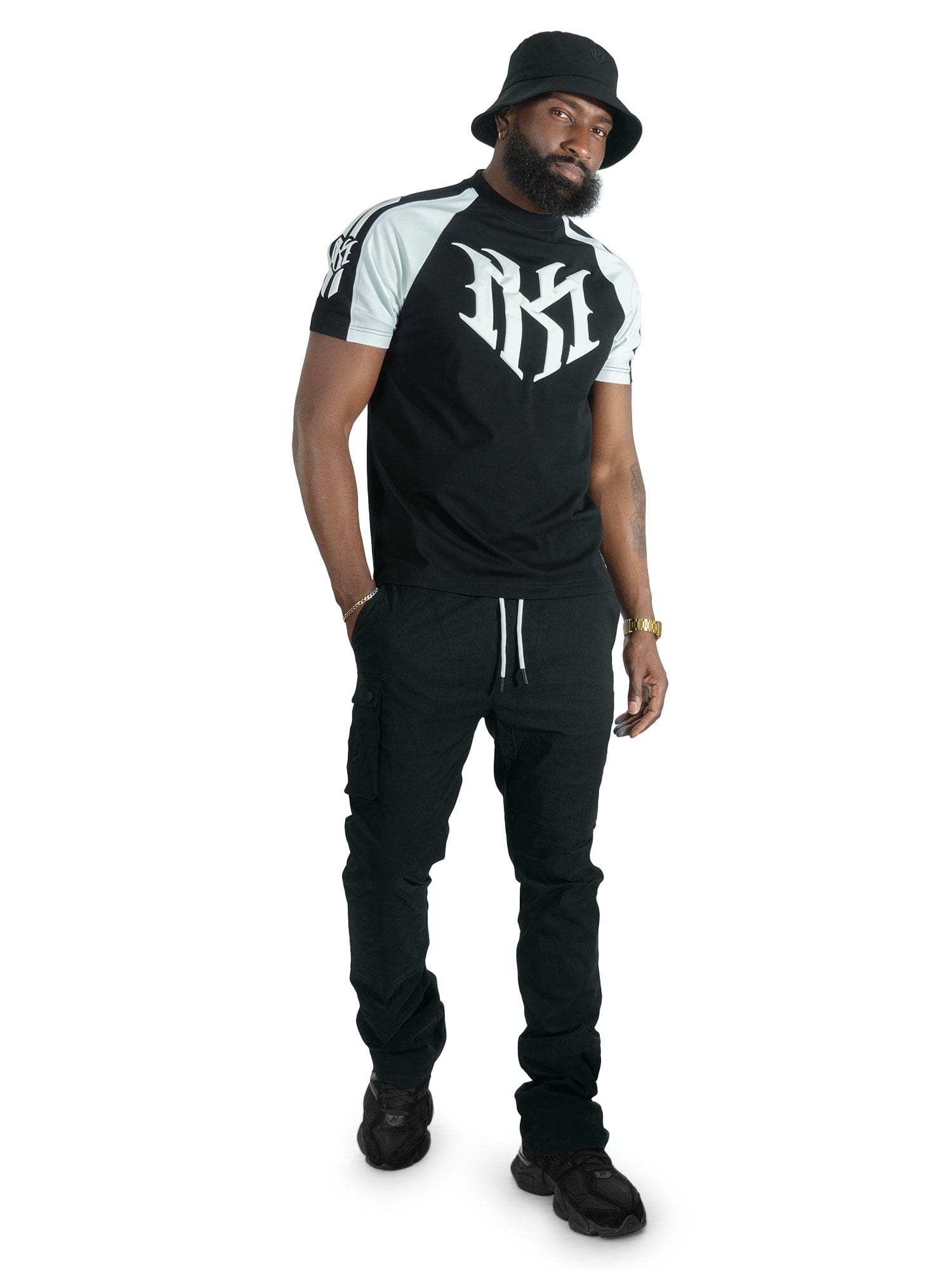 Black Makobi M119 Adorni Reglan T-Shirt featuring a relaxed fit and stylish design, displayed on a model.