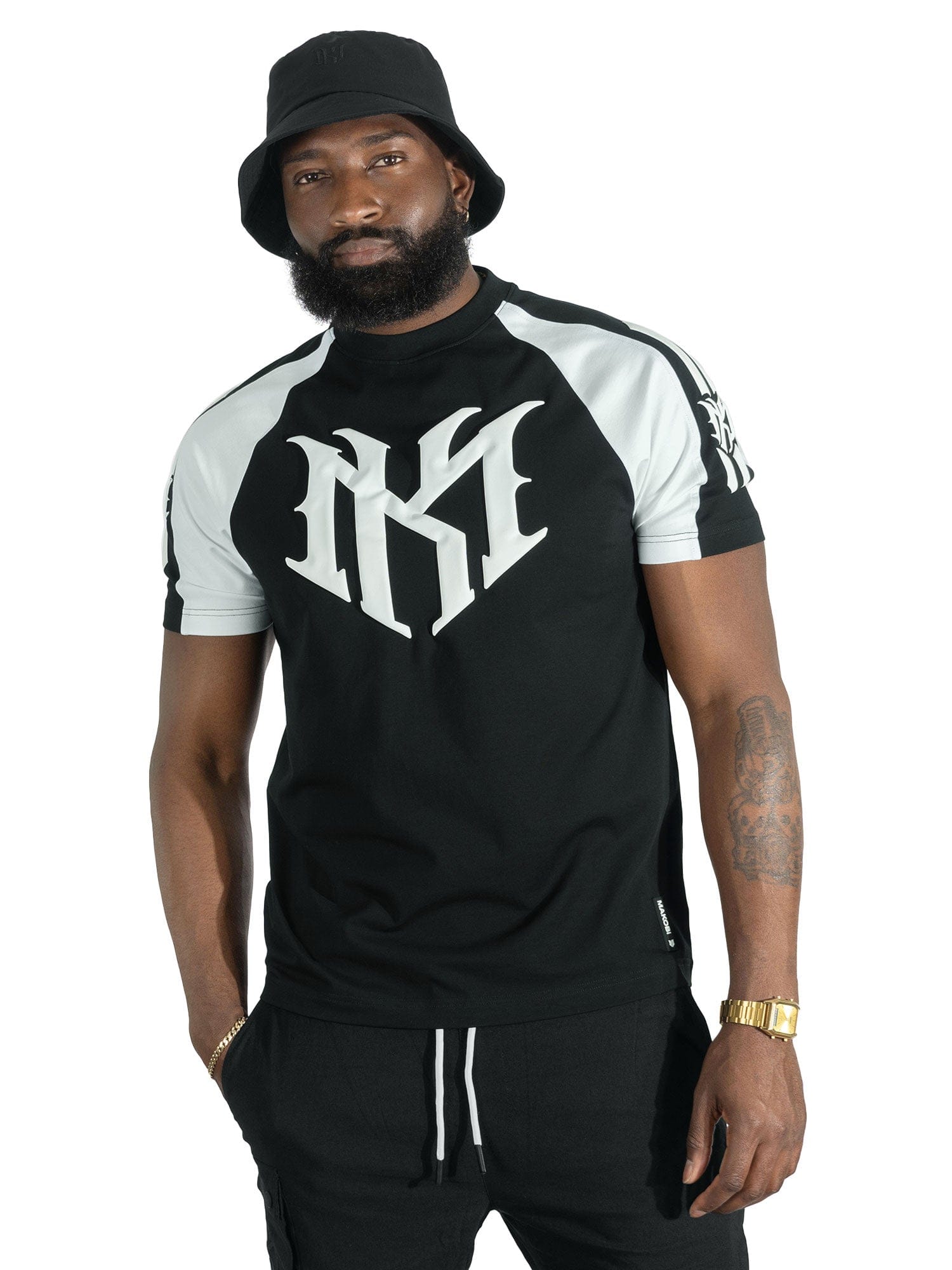 Makobi M119 Adorni Reglan T-shirt in black, featuring a casual relaxed fit with short sleeves and graphic design.