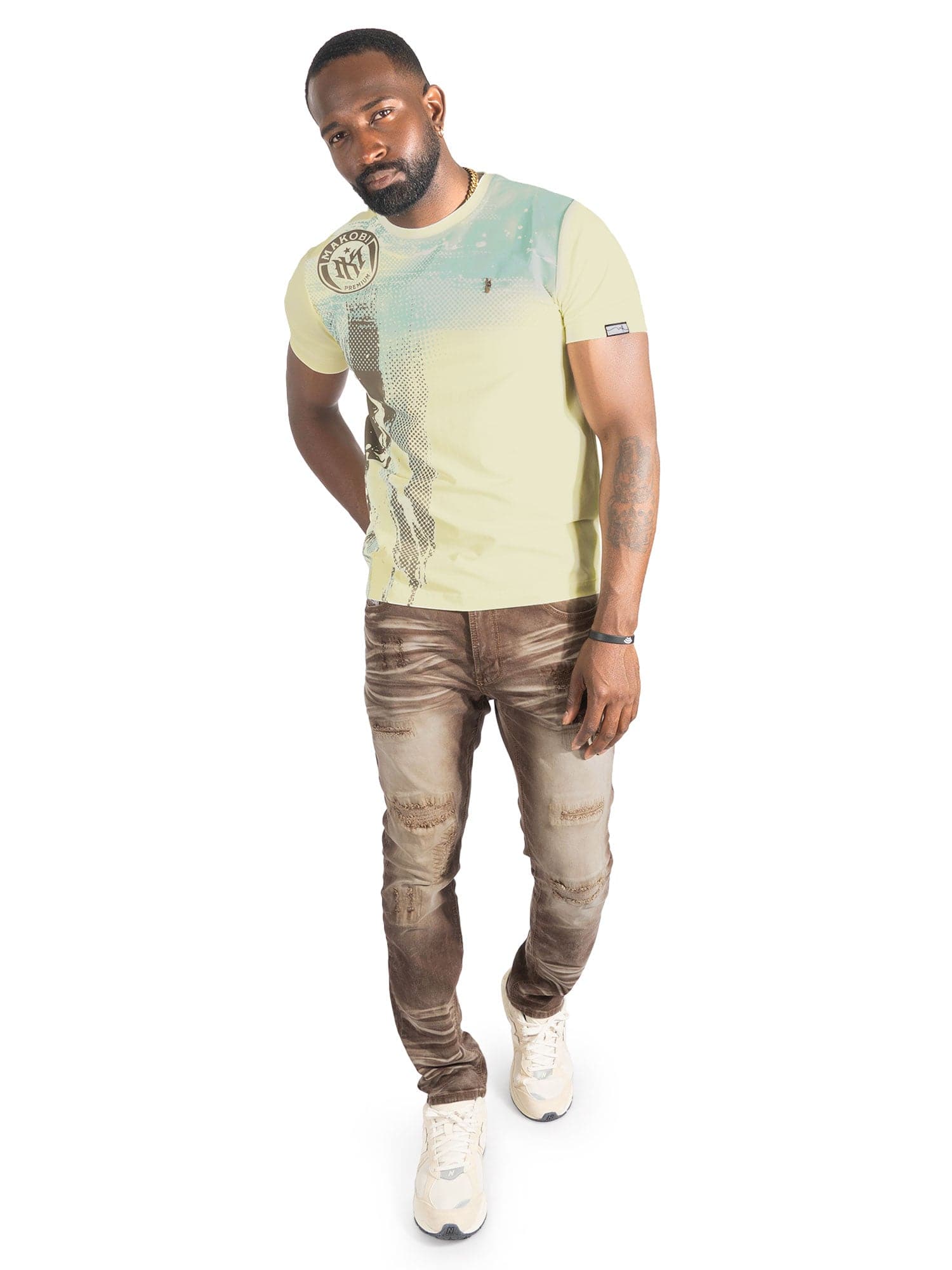 Makobi M455 MK T-Shirt in natural color, casual fit, shown on model with round neckline and short sleeves.