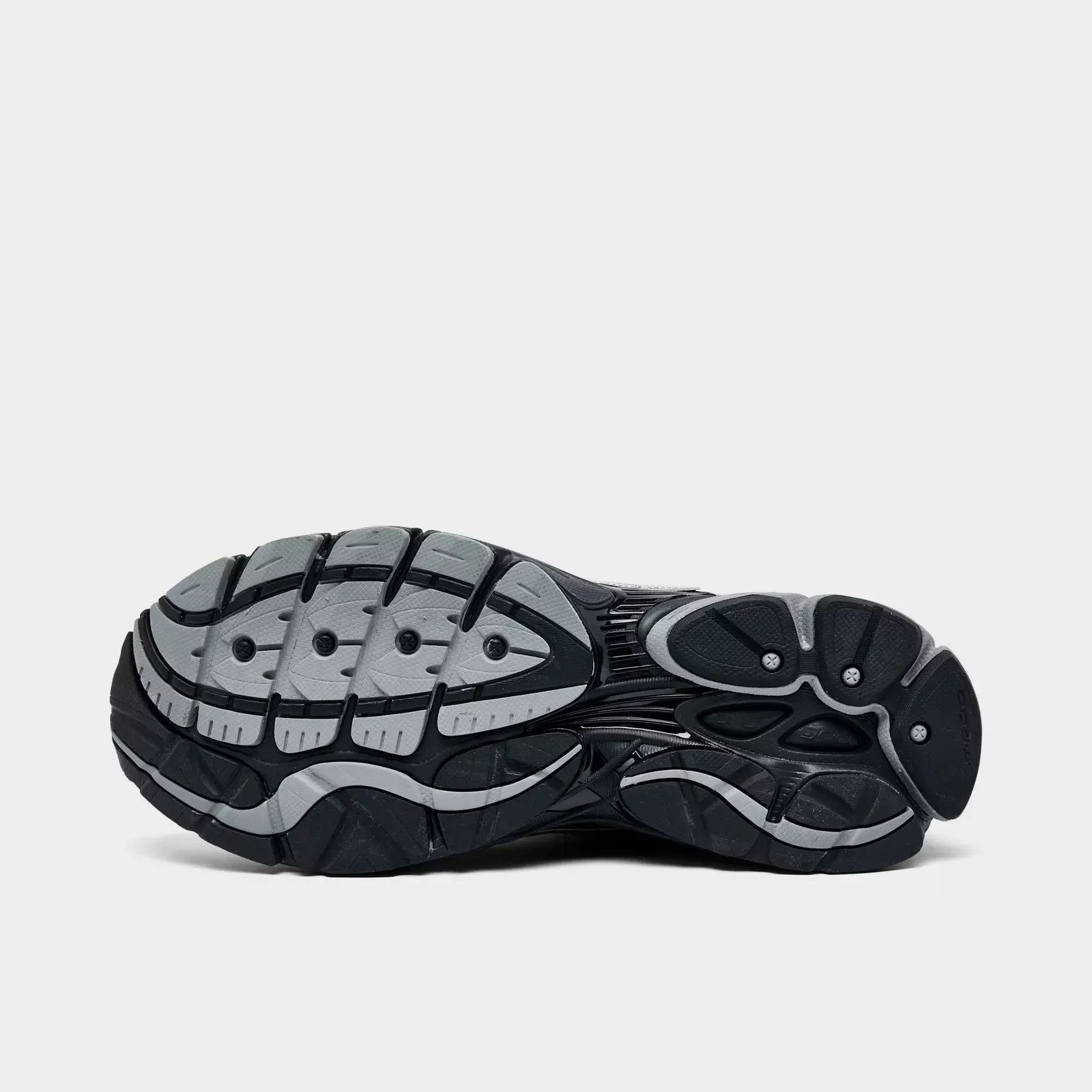 Men's Saucony ProGrid Omni 9 sneakers in black with metallic silver accents, featuring a supportive athletic design and breathable mesh.