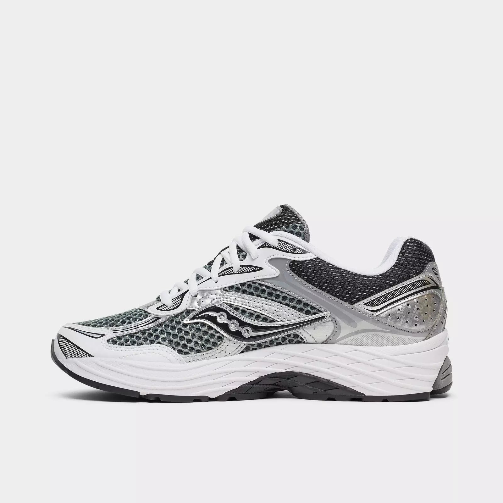 Men's Saucony ProGrid Omni 9 sneakers in grey and silver with cushioned soles and sporty design.