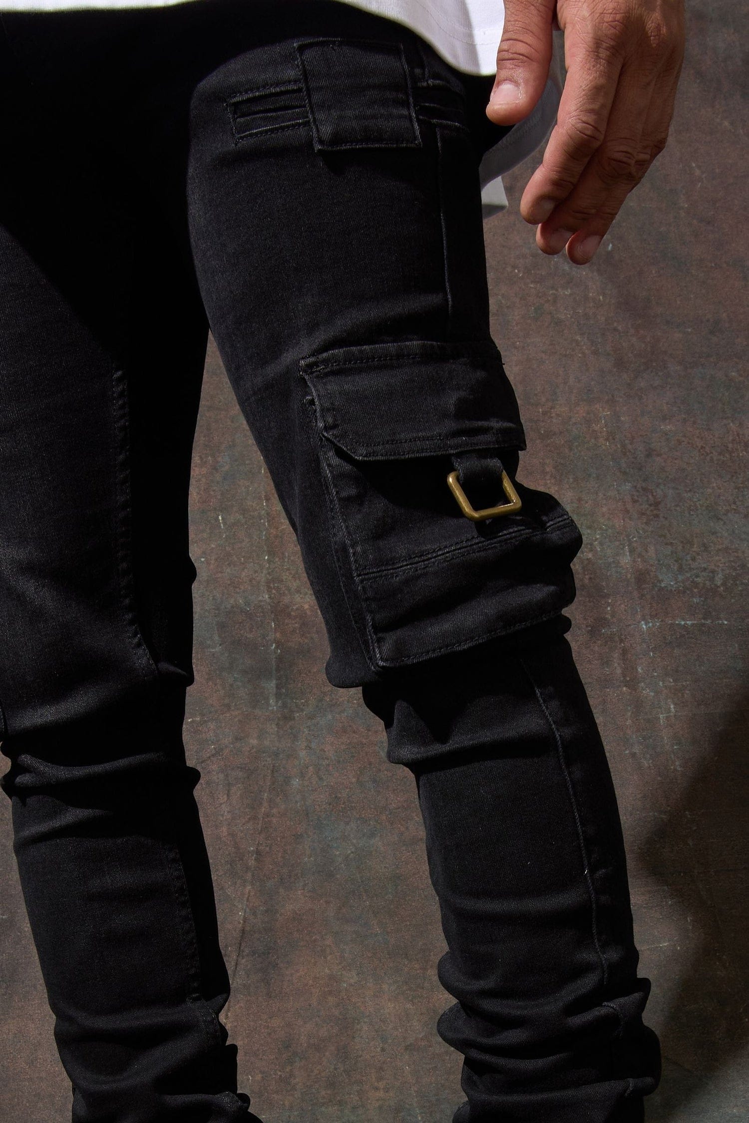 Serenede PNTH-2 Panthera Cargo Jeans in black denim with multiple cargo pockets and a relaxed fit, front view.