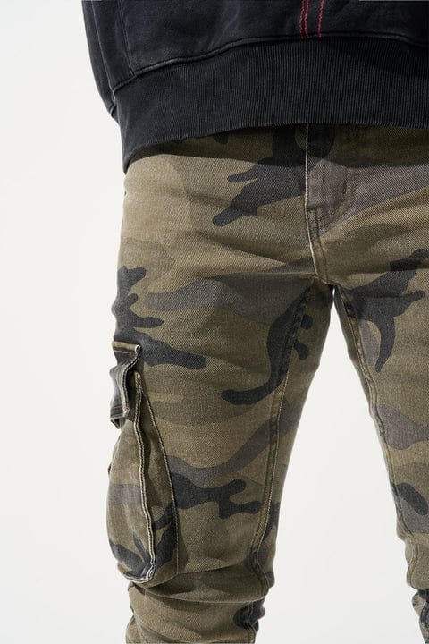 Serenede Warsaint cargo jeans in denim, showing the right side with multiple large cargo pockets and a tapered fit.