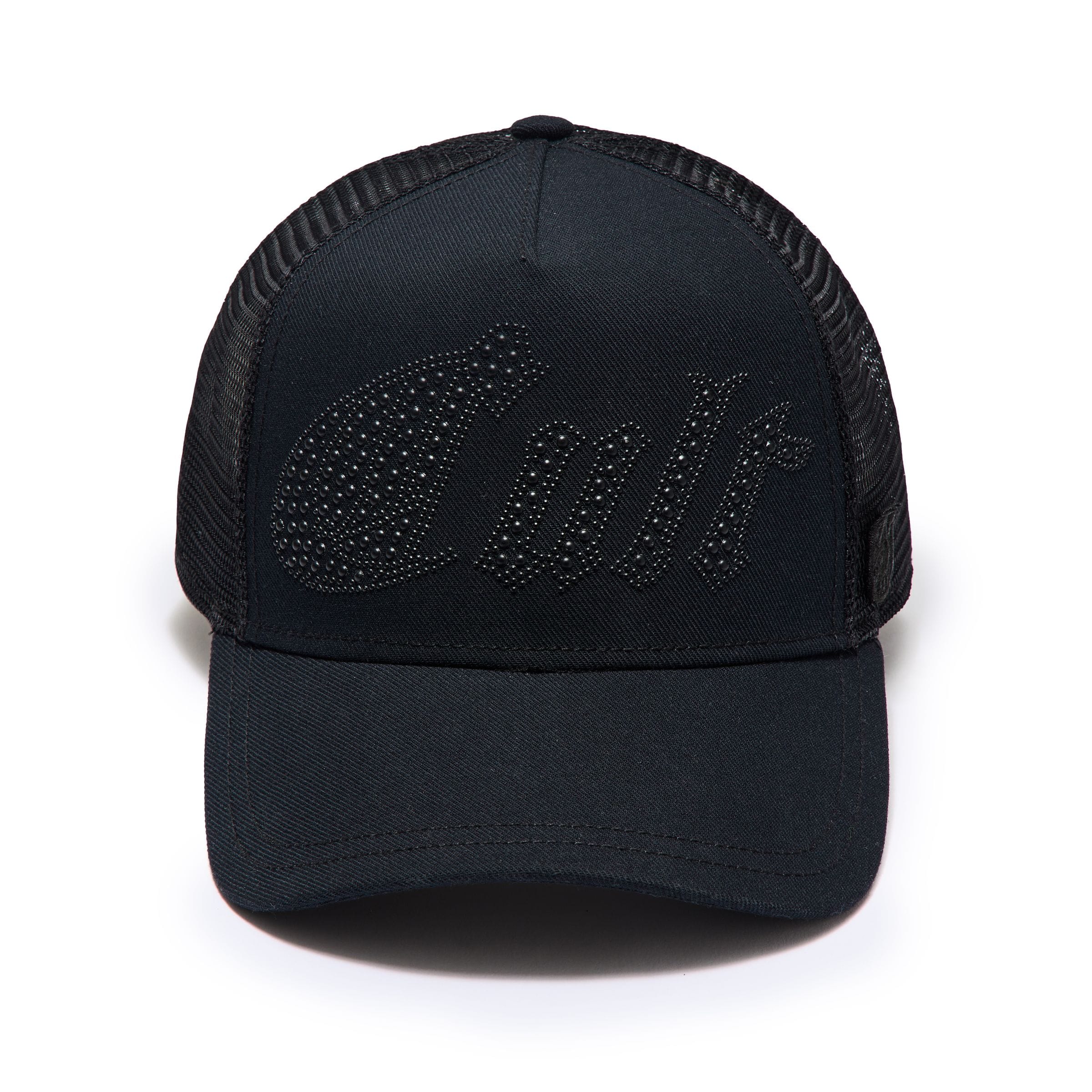 Cult of Individuality Metal Studs Mesh Back Trucker Hat with adjustable strap and branded front panel.