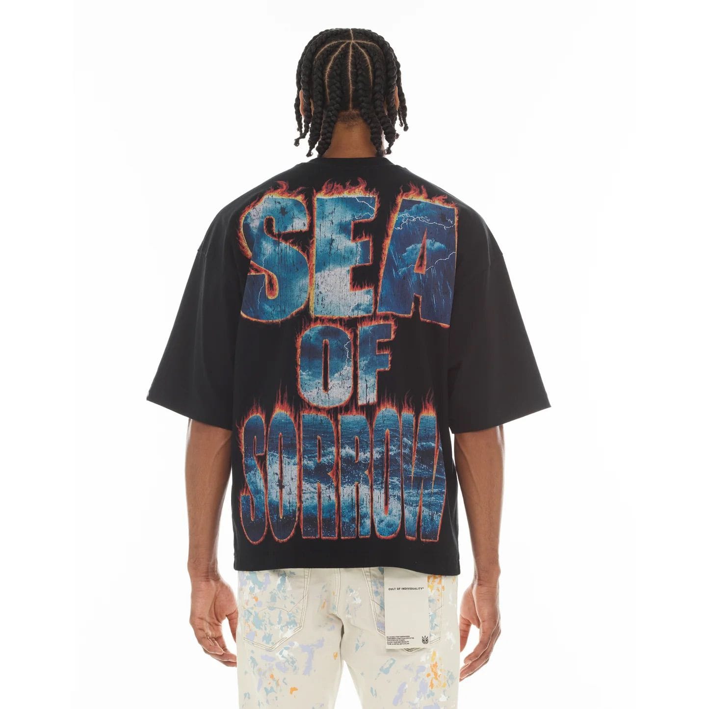 Cult of Individuality Cult Sea of Sorrow oversized T-shirt featuring graphic print and relaxed fit, displayed on a hanger.