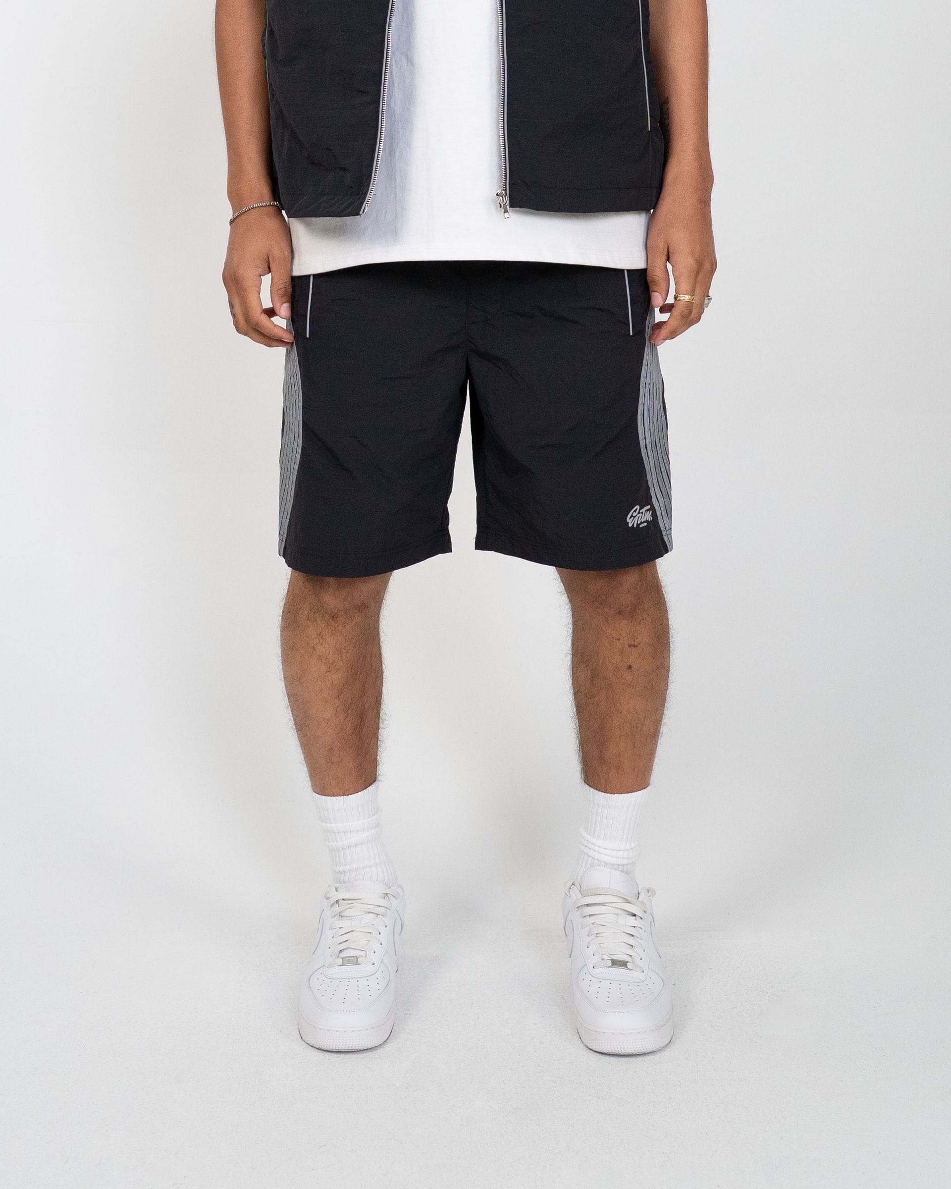 EPTM Valley Set in black, featuring a stylish matching top and pants, displayed on a mannequin with a minimalist background.