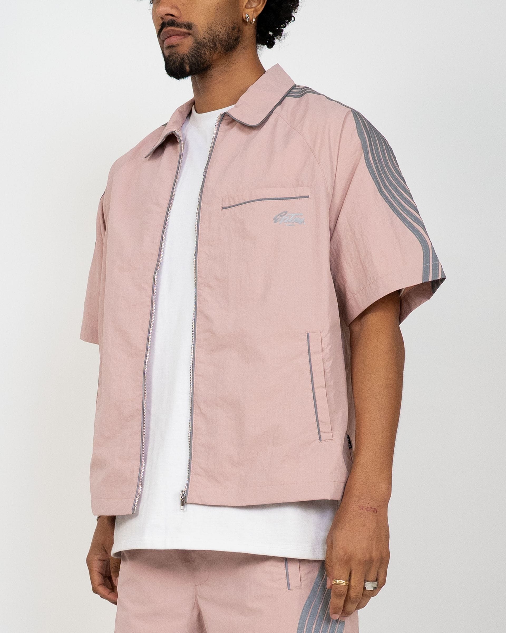 Pink EPTM Valley Set featuring a stylish matching top and bottom for women, shown laid out flat.