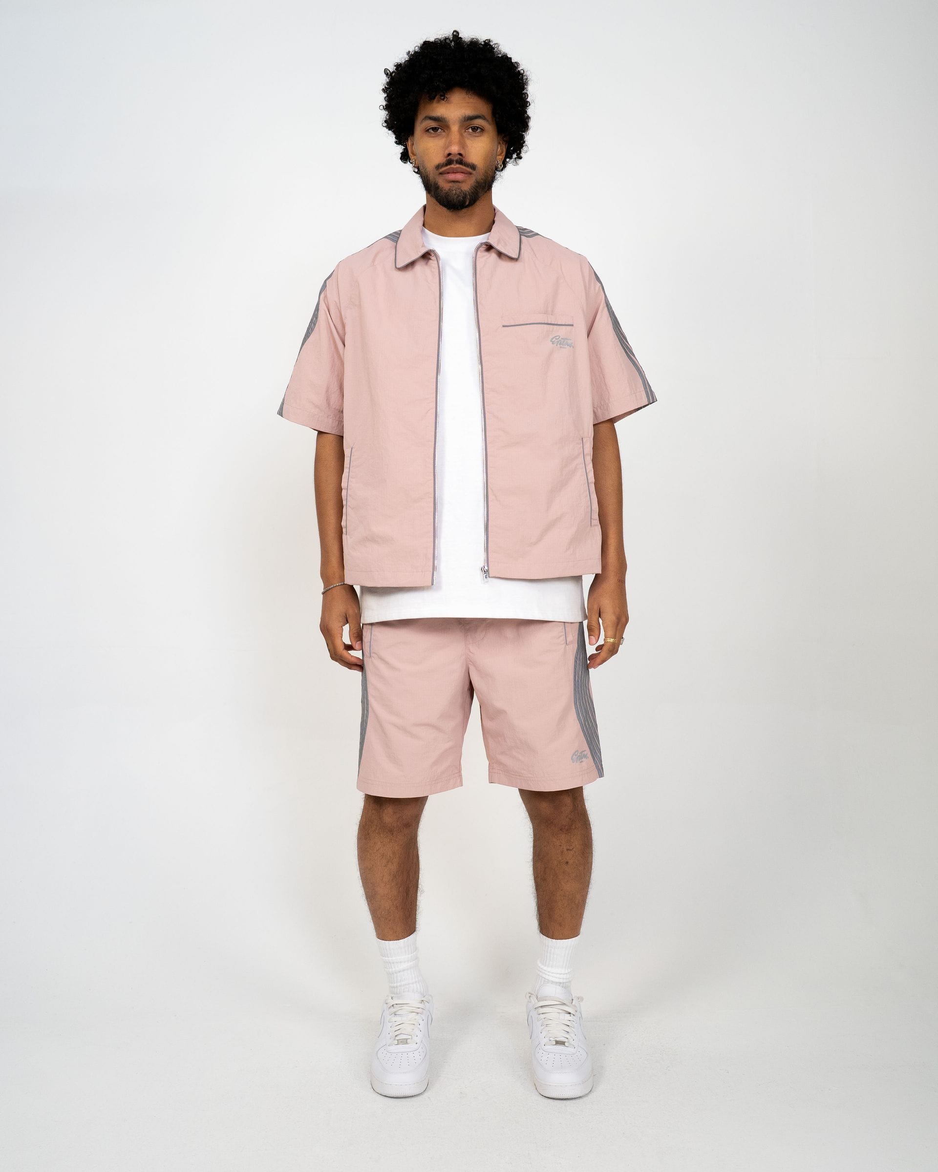 Pink EPTM Valley Set, a stylish matching clothing set with top and bottom pieces, designed for comfortable, casual wear.