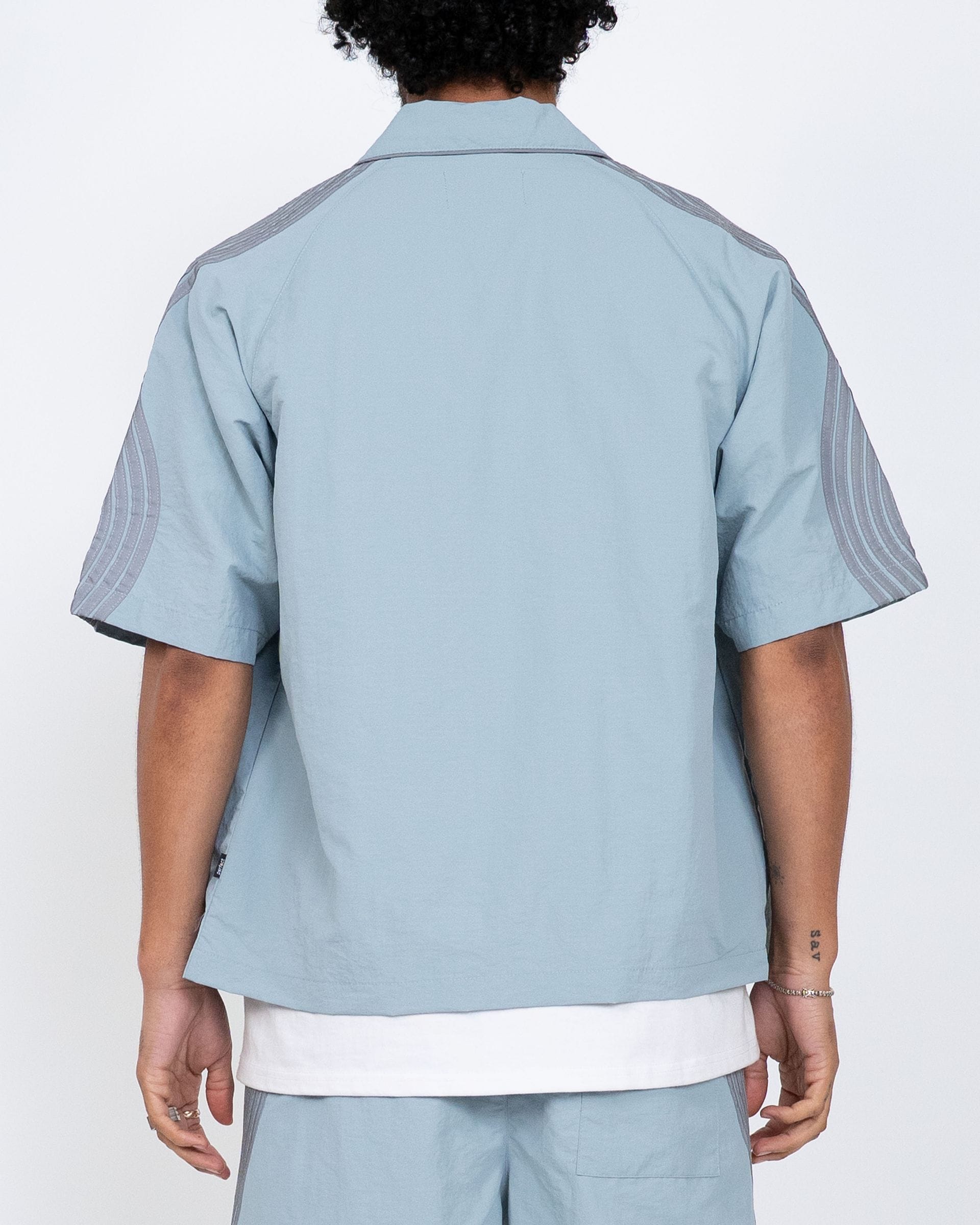 Blue EPTM Valley Shirt set featuring a stylish shirt and matching shorts, perfect for casual wear.