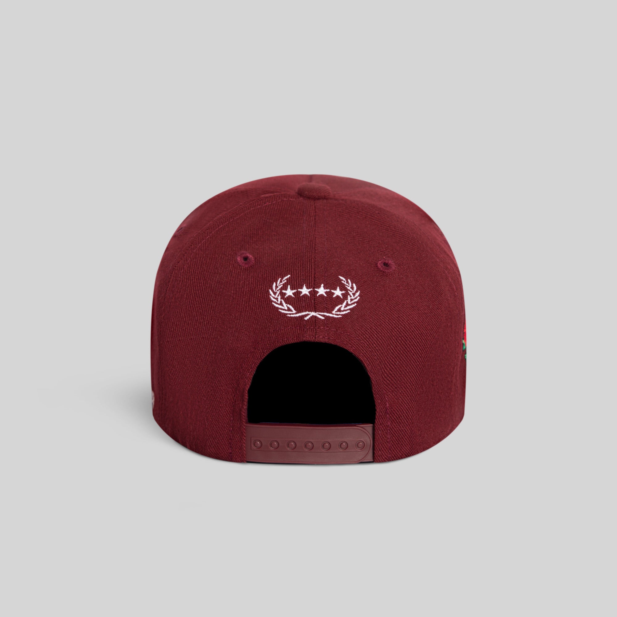 Field Grade Buy Her Flowers Bordeaux Wool Trucker hat shown from the back, featuring a stylish wool construction and adjustable strap.