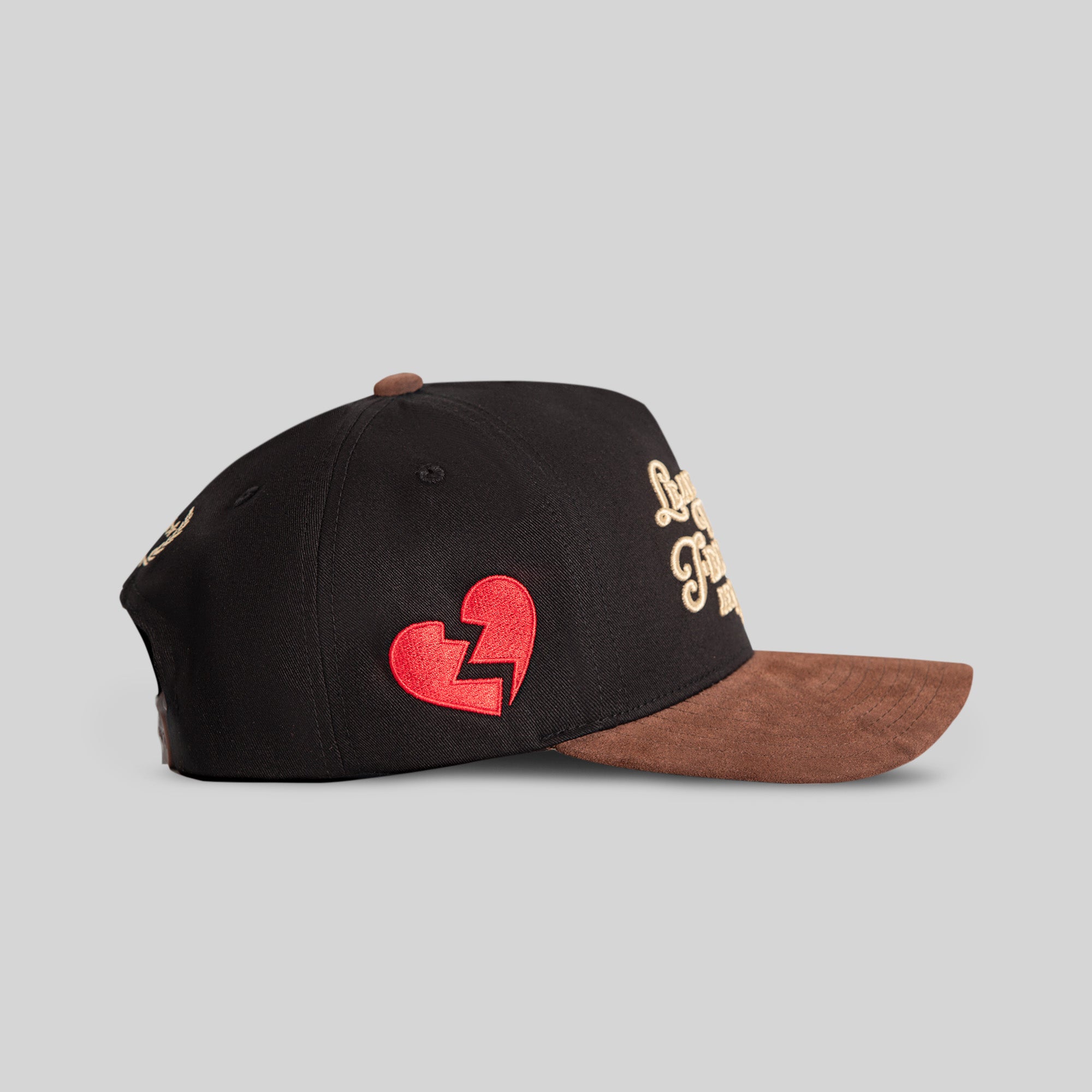 Black mocha twill and suede trucker hat by Field Grade featuring a classic structured design and adjustable snapback closure.