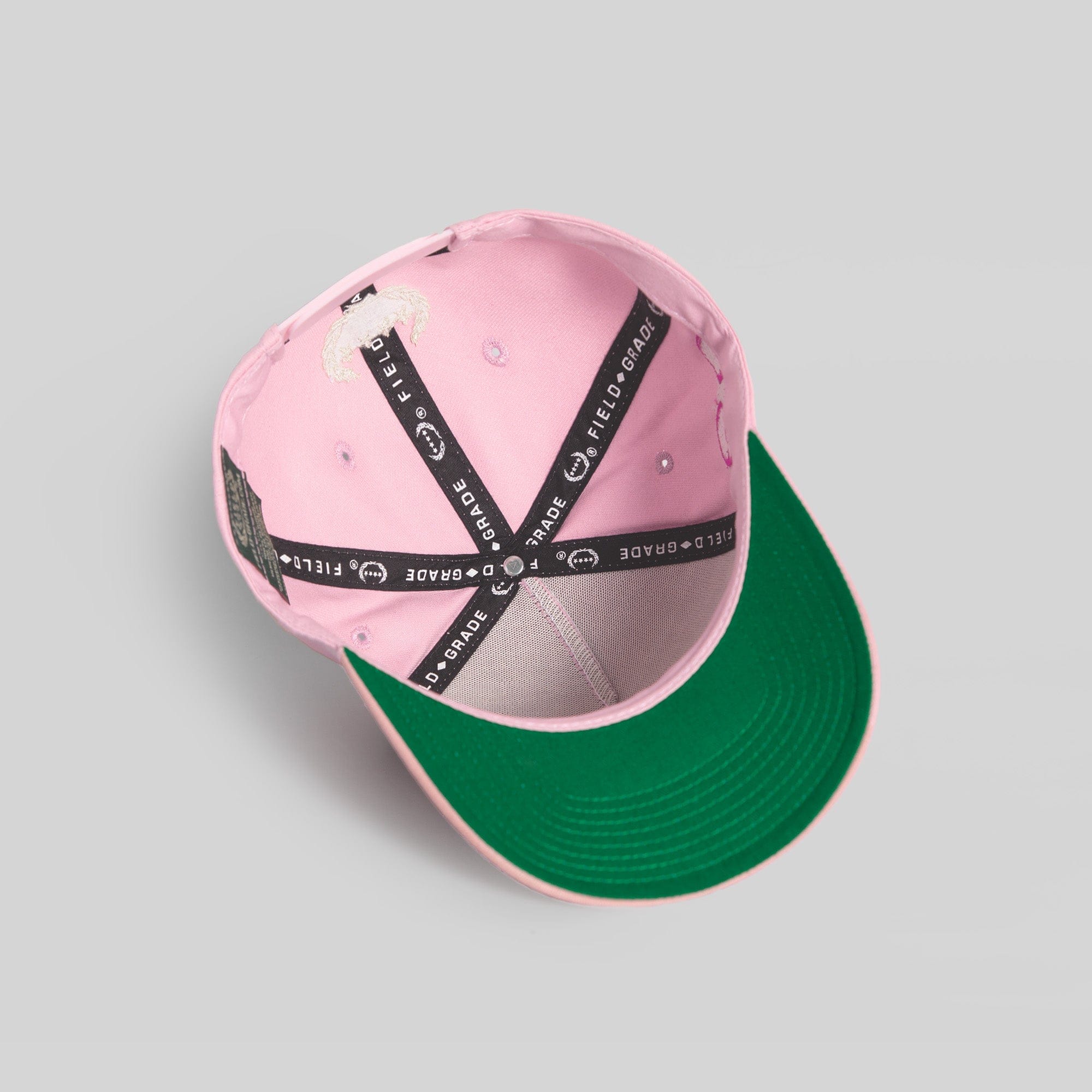 Field Grade Leave Your Feelings Rose Wool Trucker Hat with embroidered rose design and adjustable strap, casual and stylish headwear.