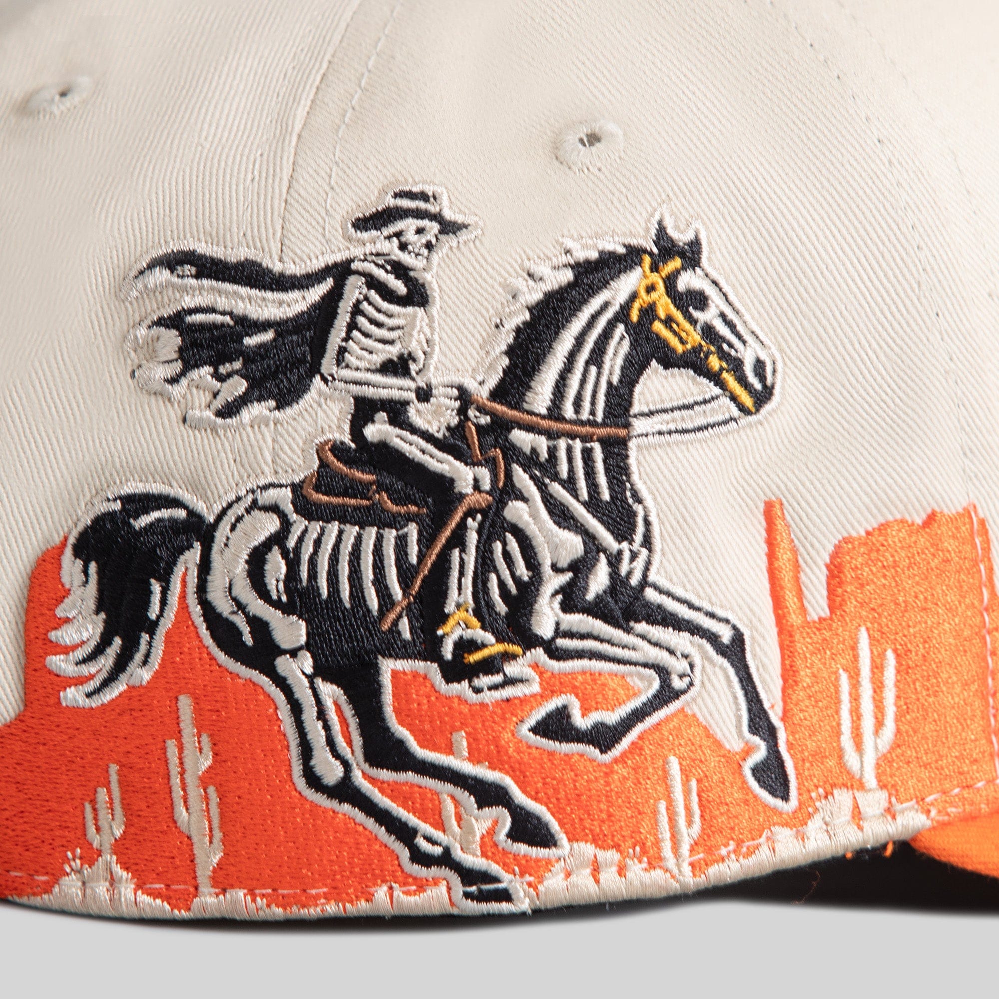 Field Grade Road To Nowhere Sand Orange Twill Trucker hat with curved brim and adjustable strap, front logo patch visible.