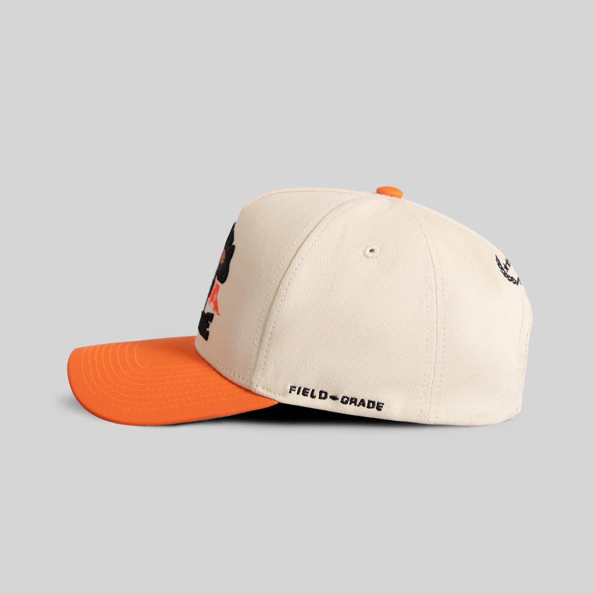 Field Grade Road To Nowhere Sand Orange Twill Trucker hat with curved brim and adjustable snapback closure.