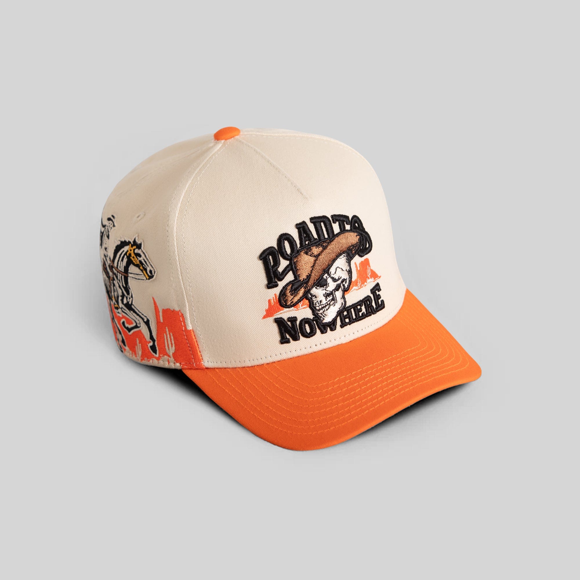 Field Grade Road To Nowhere Sand Orange Twill Trucker Hat with curved brim and adjustable strap.