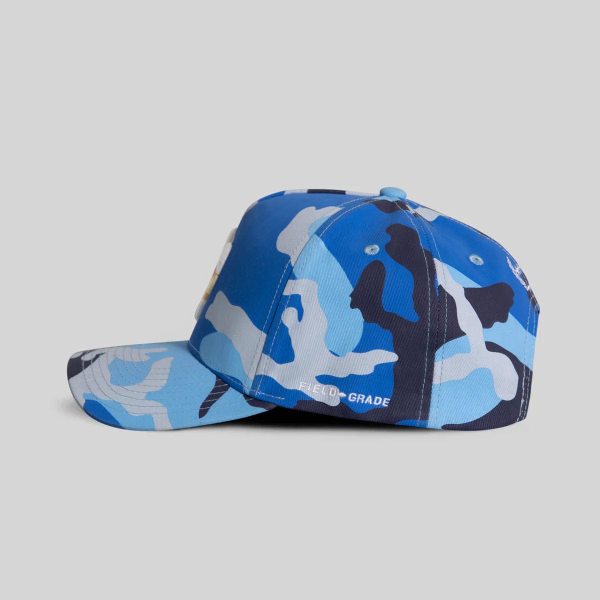 Field Grade Yankee Camo Ice Blue Hat featuring a camouflage pattern and adjustable strap, outdoor hat for men and women.
