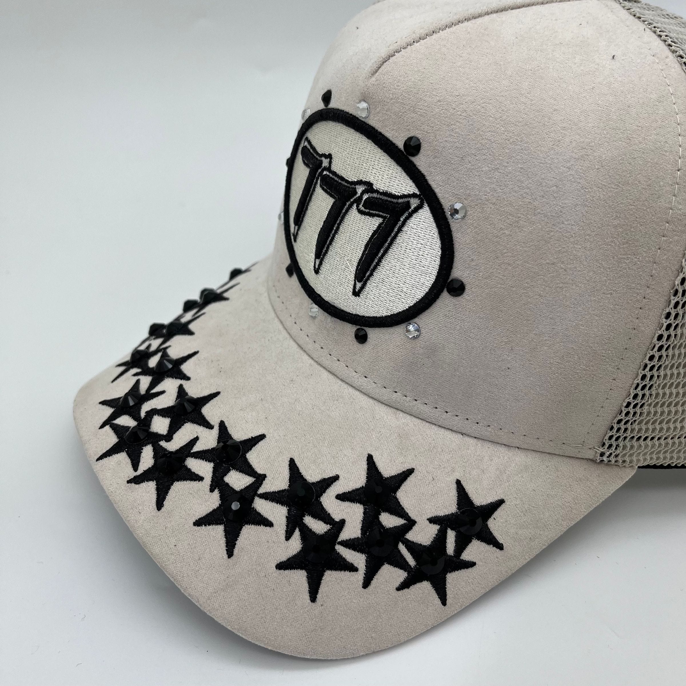 Cream Hudson Outerwear V1 Diamond Suede Trucker Hat featuring a classic design with mesh back and adjustable strap.