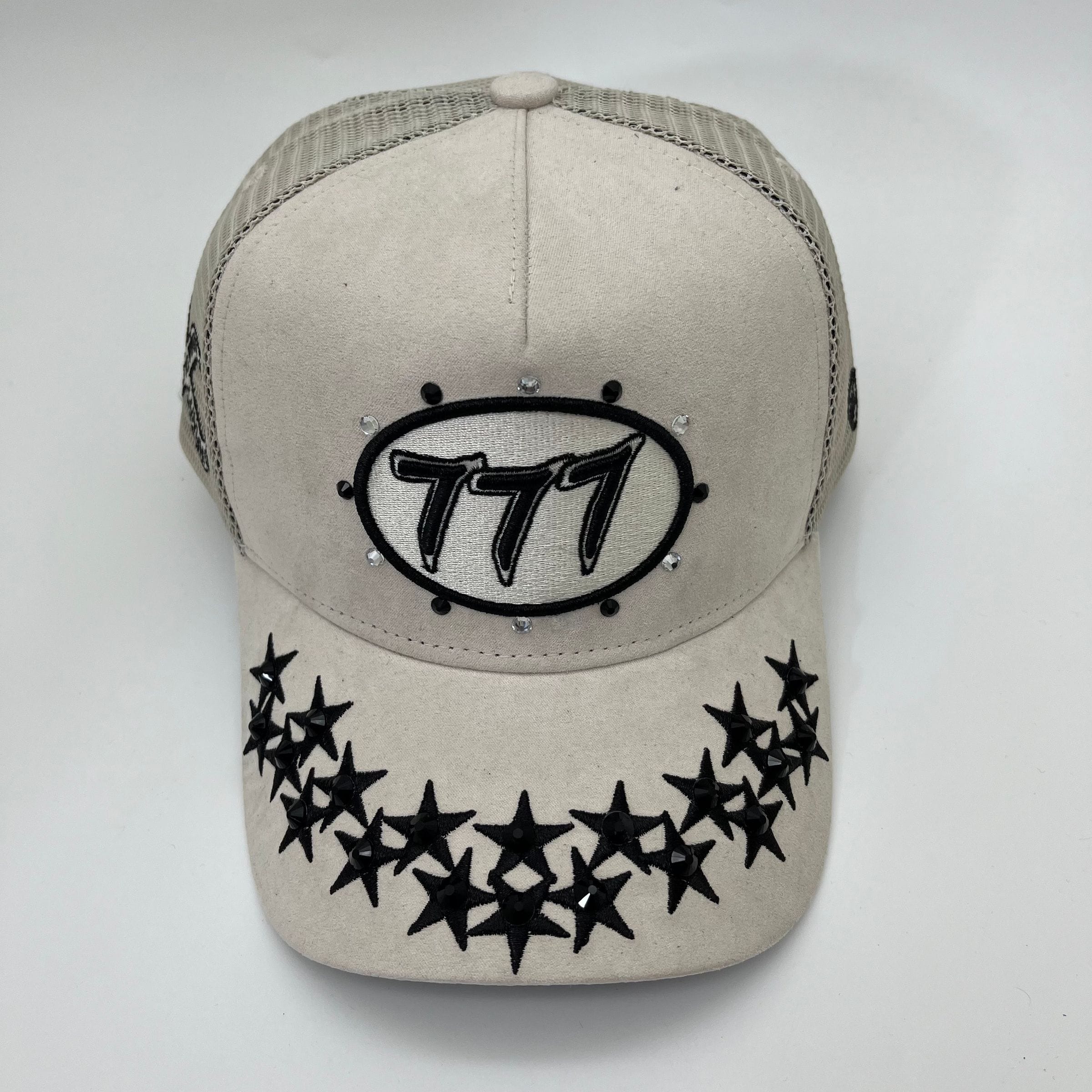 Cream Hudson Outerwear V1 Diamond Suede Trucker Hat with embroidered logo, adjustable snapback, and classic trucker style.