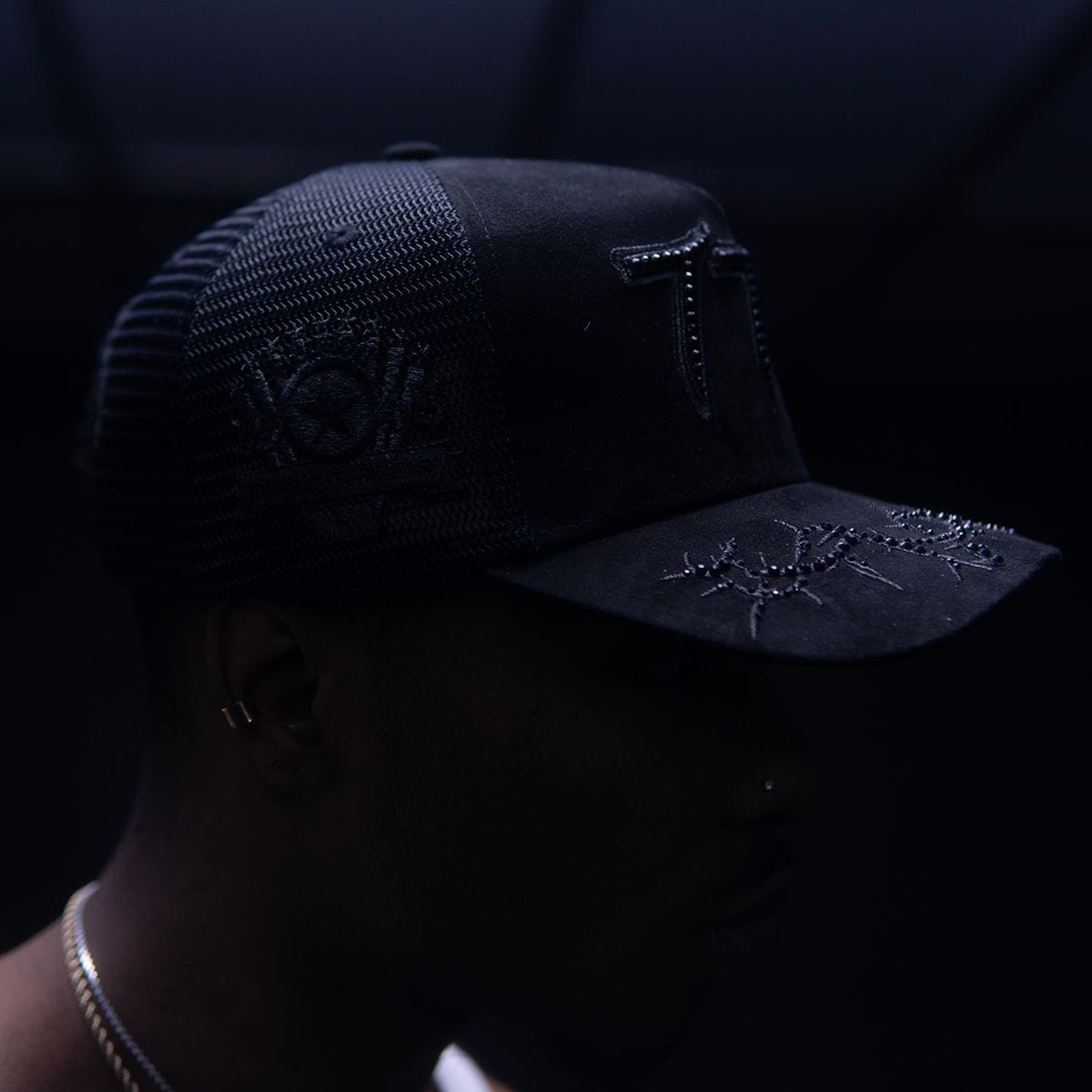 Black Hudson Outerwear V2 Diamond Suede Trucker Hat with front panel and adjustable strap, stylish and casual men's hat.