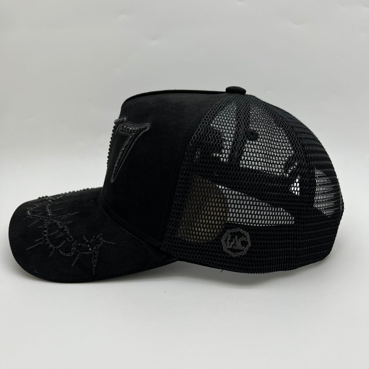 Black Hudson Outerwear V2 Diamond Suede Trucker Hat with adjustable strap and branded logo patch.