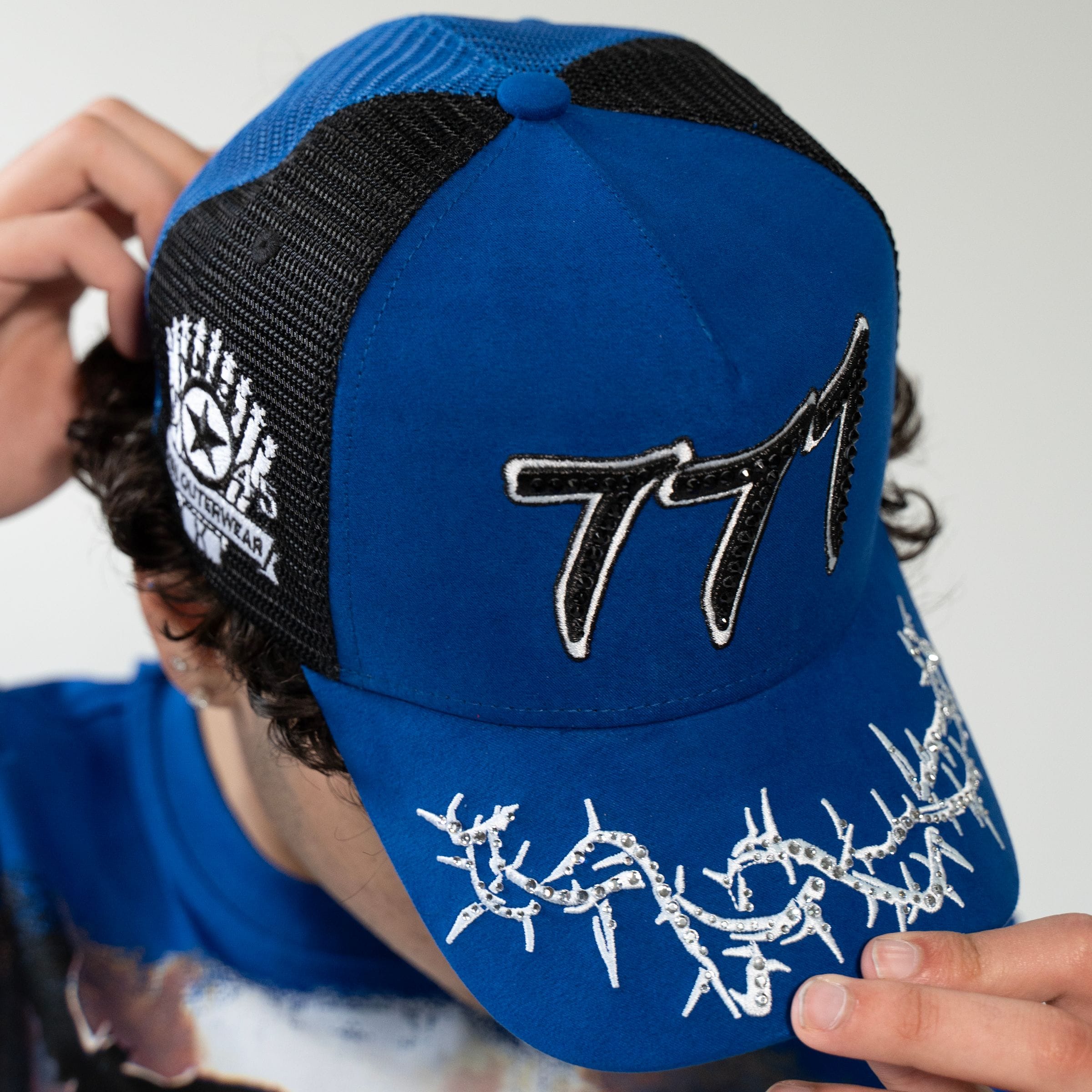 Blue Hudson Outerwear V2 Diamond Suede Trucker Hat with structured brim and adjustable snapback for a classic outdoor style.
