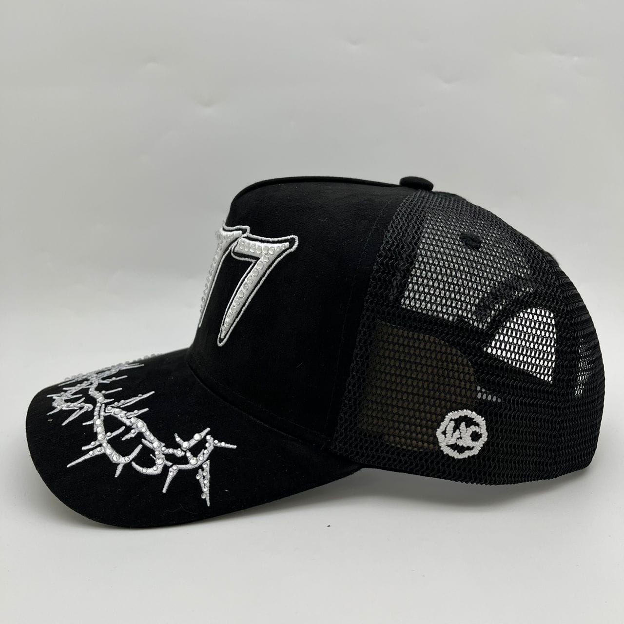 Hudson Outerwear V2 Diamond Suede Trucker Hat with mesh back and branded patch, in diamond pattern suede fabric.