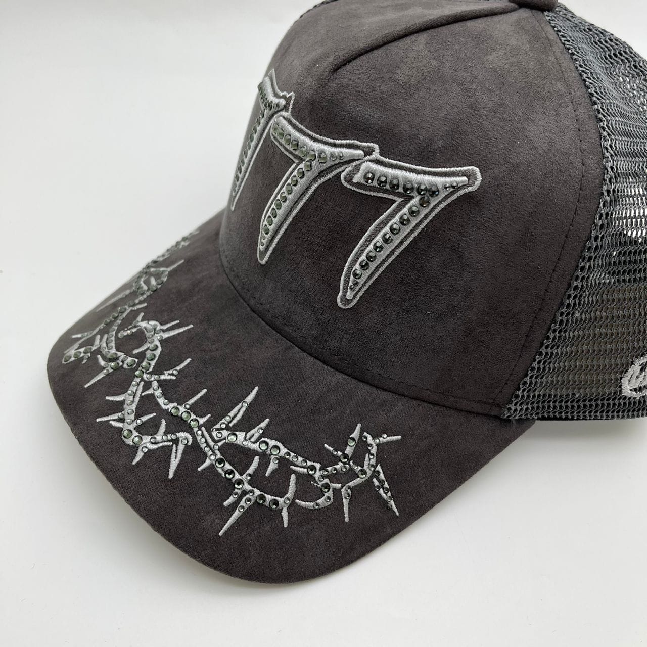 Hudson Outerwear V2 Diamond Suede Trucker Hat with adjustable snapback and diamond-patterned suede fabric.